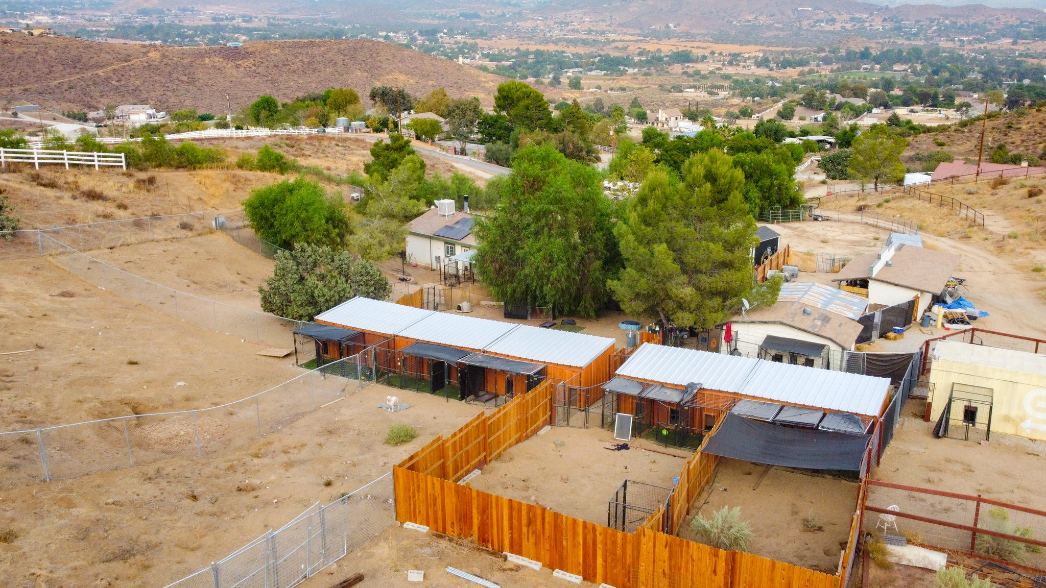 32035 Mountain Shadow Road Acton, CA 93510 - Photo 32 of 34 an aerial view of residential houses with outdoor space and ocean view