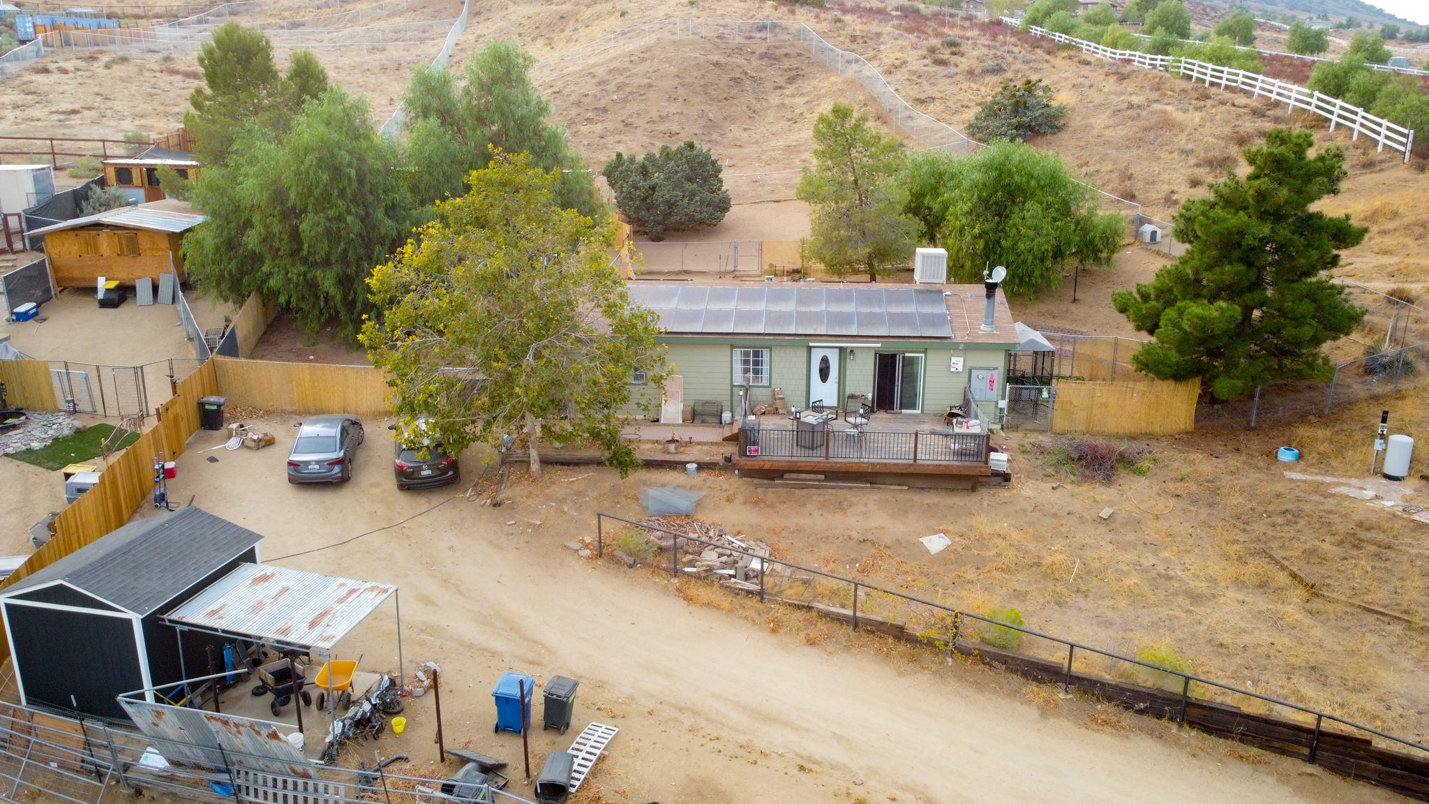 32035 Mountain Shadow Road Acton, CA 93510 - Photo 5 of 34 a view of a house with a patio