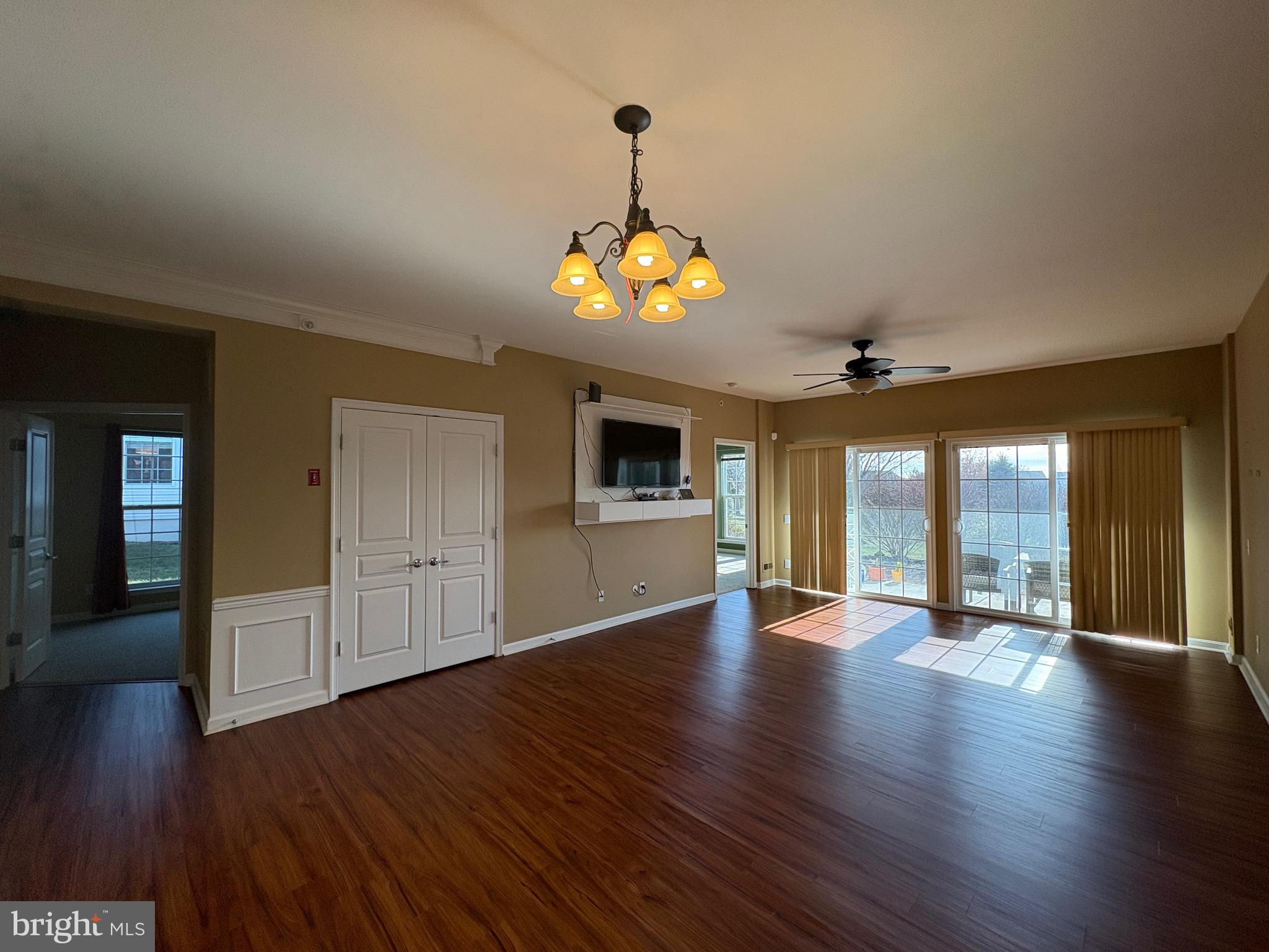 580 Prizer Court Downingtown, PA 19335 - Photo 7 of 28 a view of an empty room with wooden floor and a window