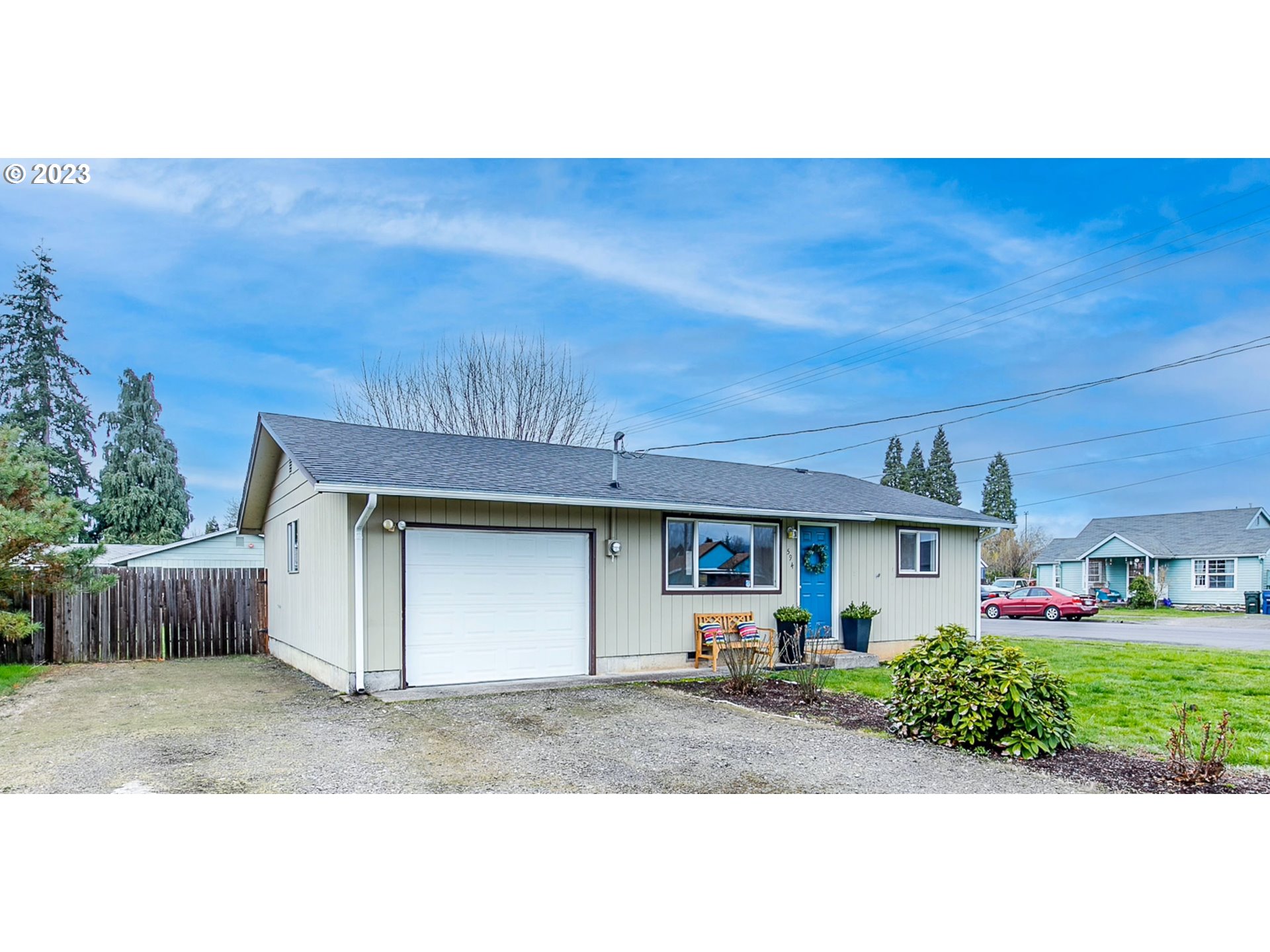 594 39th Street Springfield, OR 97478 - Photo 2 of 18 a view of a house with a yard and garage