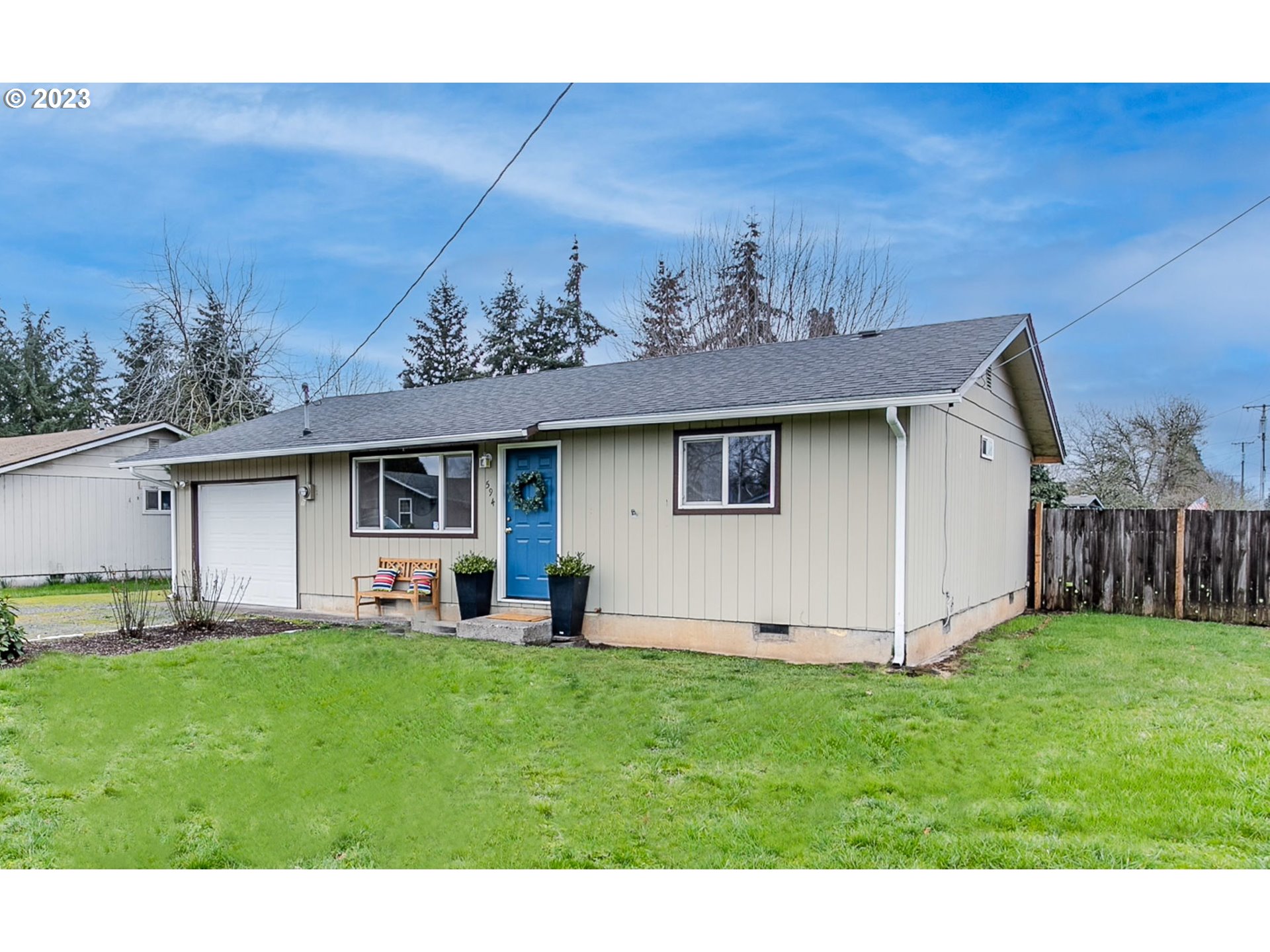 594 39th Street Springfield, OR 97478 - Photo 3 of 18 a view of a yard in front of a house with a yard