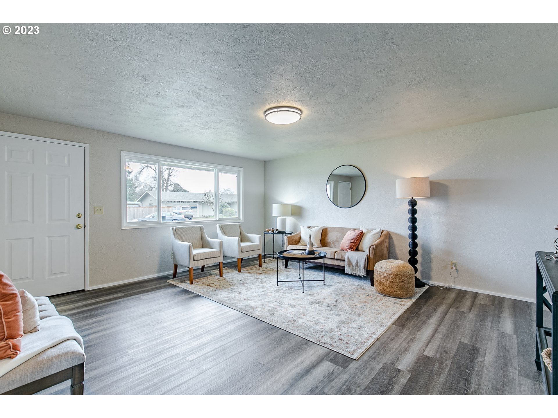 594 39th Street Springfield, OR 97478 - Photo 6 of 18 a living room with furniture and a wooden floor
