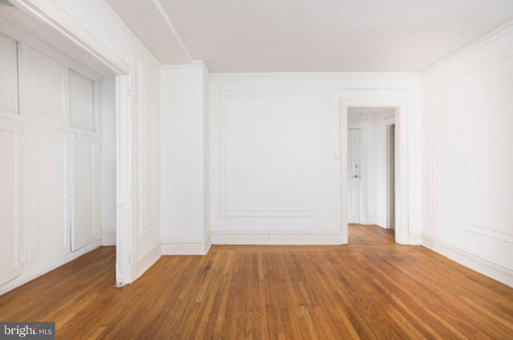 2100-2 Walnut Street, Unit 12K Philadelphia, PA 19103 - Photo 24 of 34 a view of a room with wooden floor