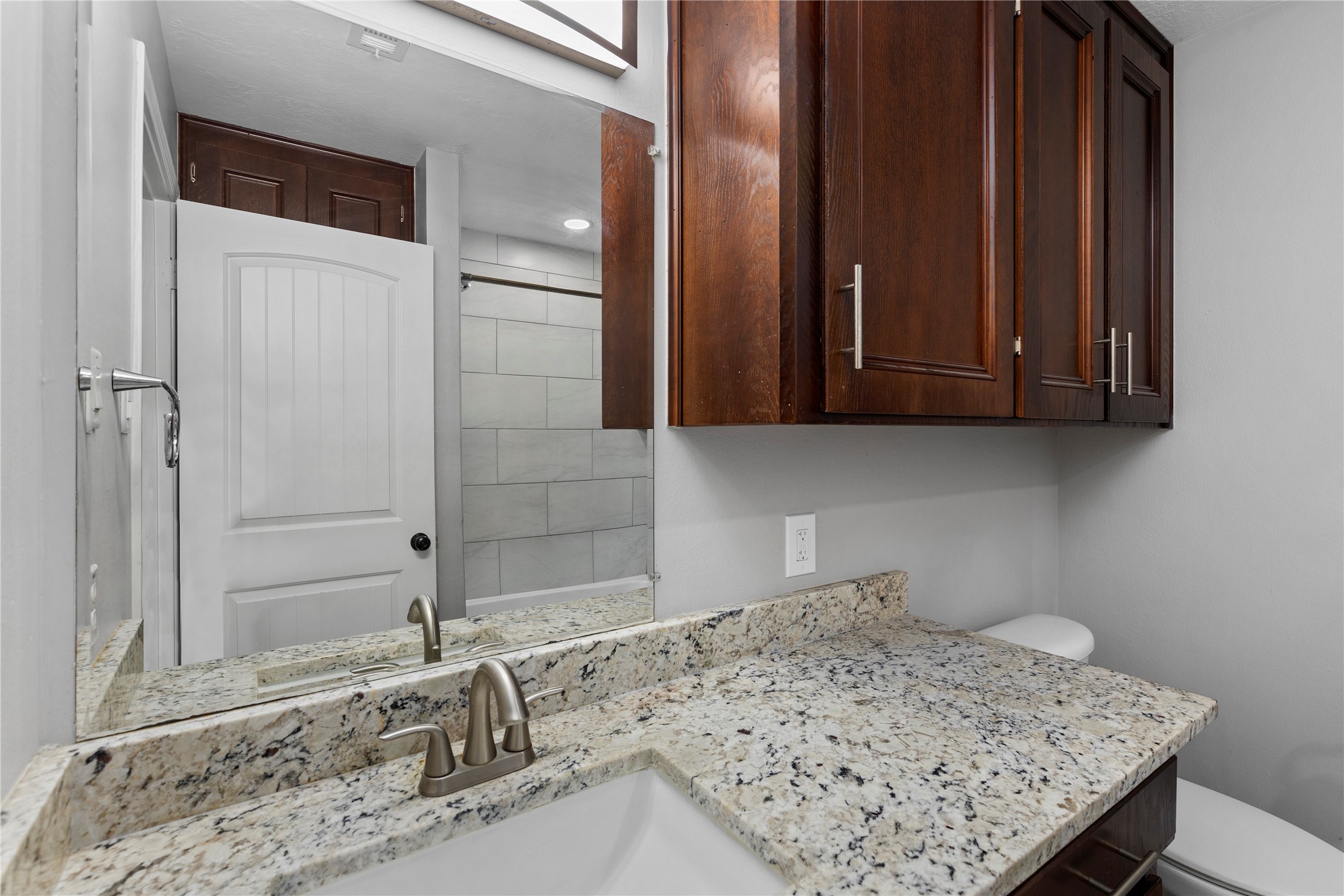 14818 Walker Road Conroe, TX 77302 - Photo 27 of 44 Guest bathroom w/single sink