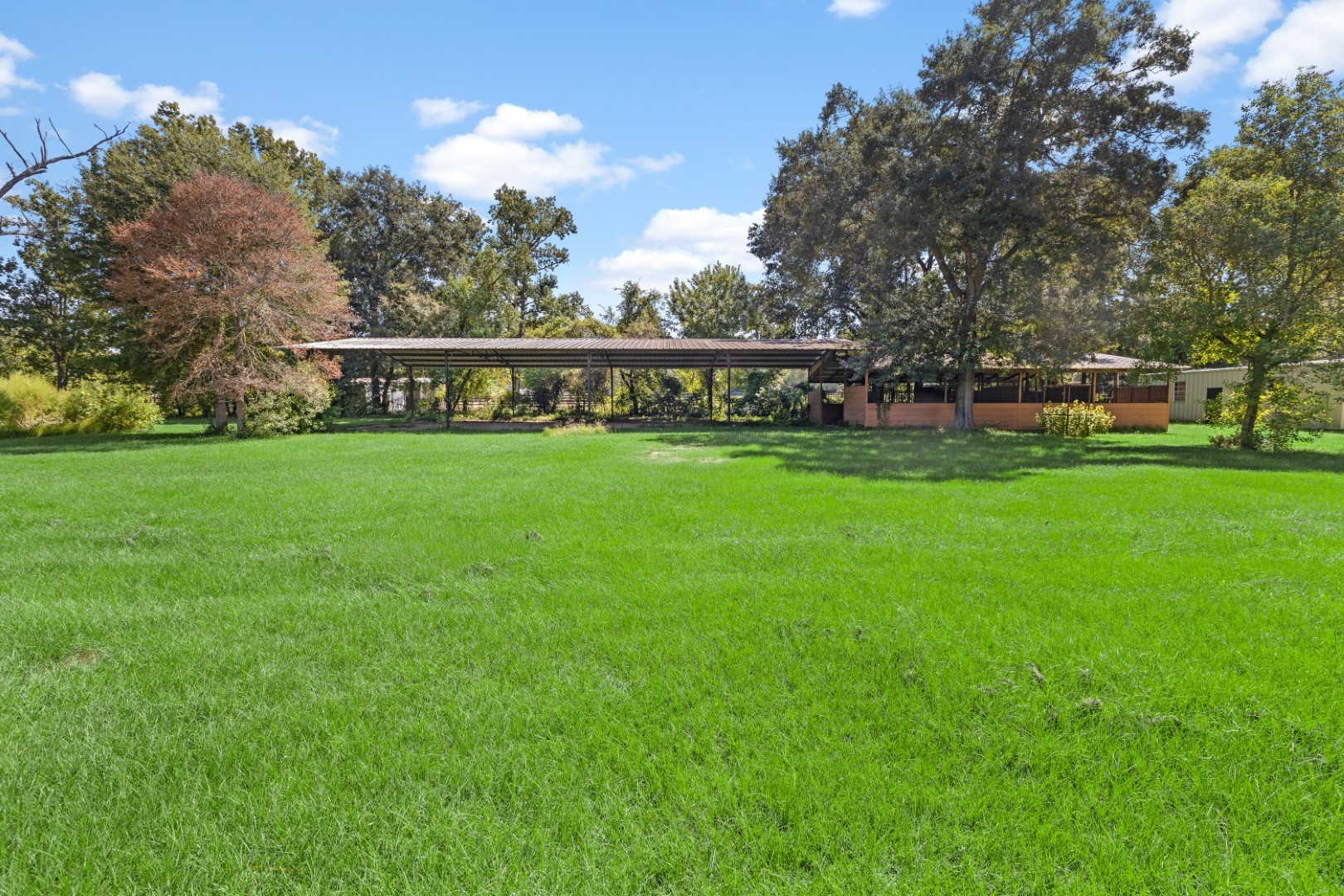 14818 Walker Road Conroe, TX 77302 - Photo 29 of 44 Pole Barn and Barn - Side View