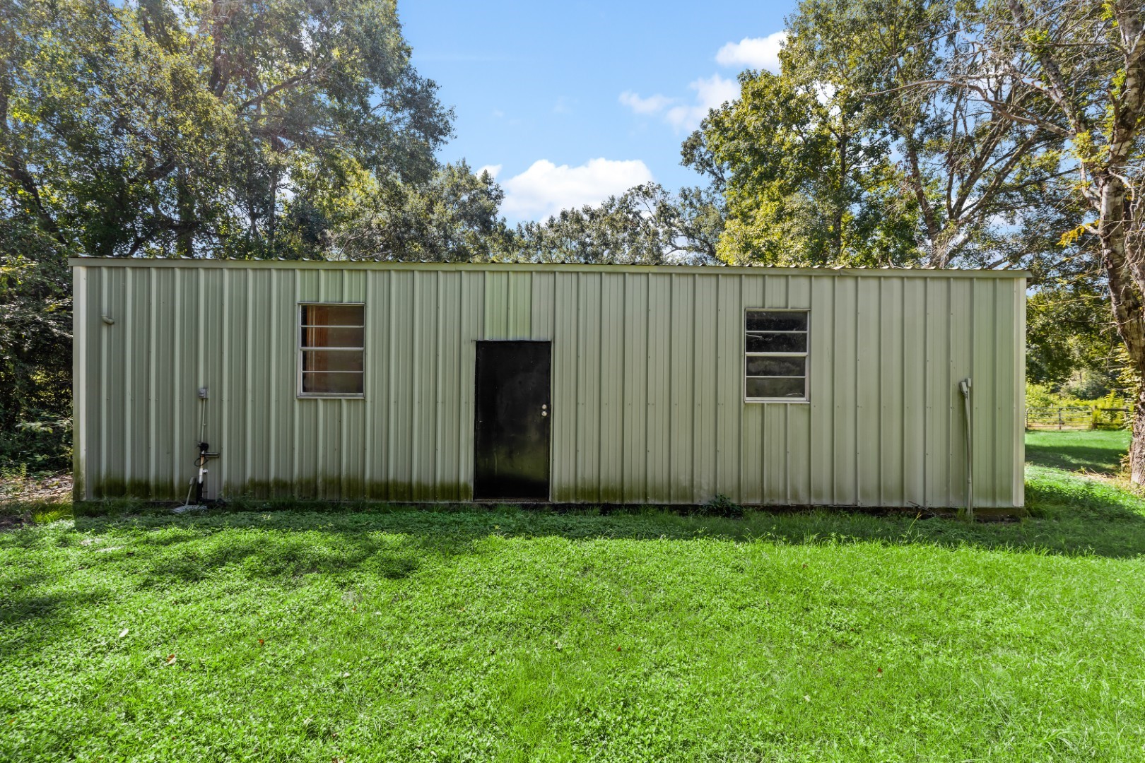 14818 Walker Road Conroe, TX 77302 - Photo 35 of 44 Shop and Flex Room - door enters in to Flex room