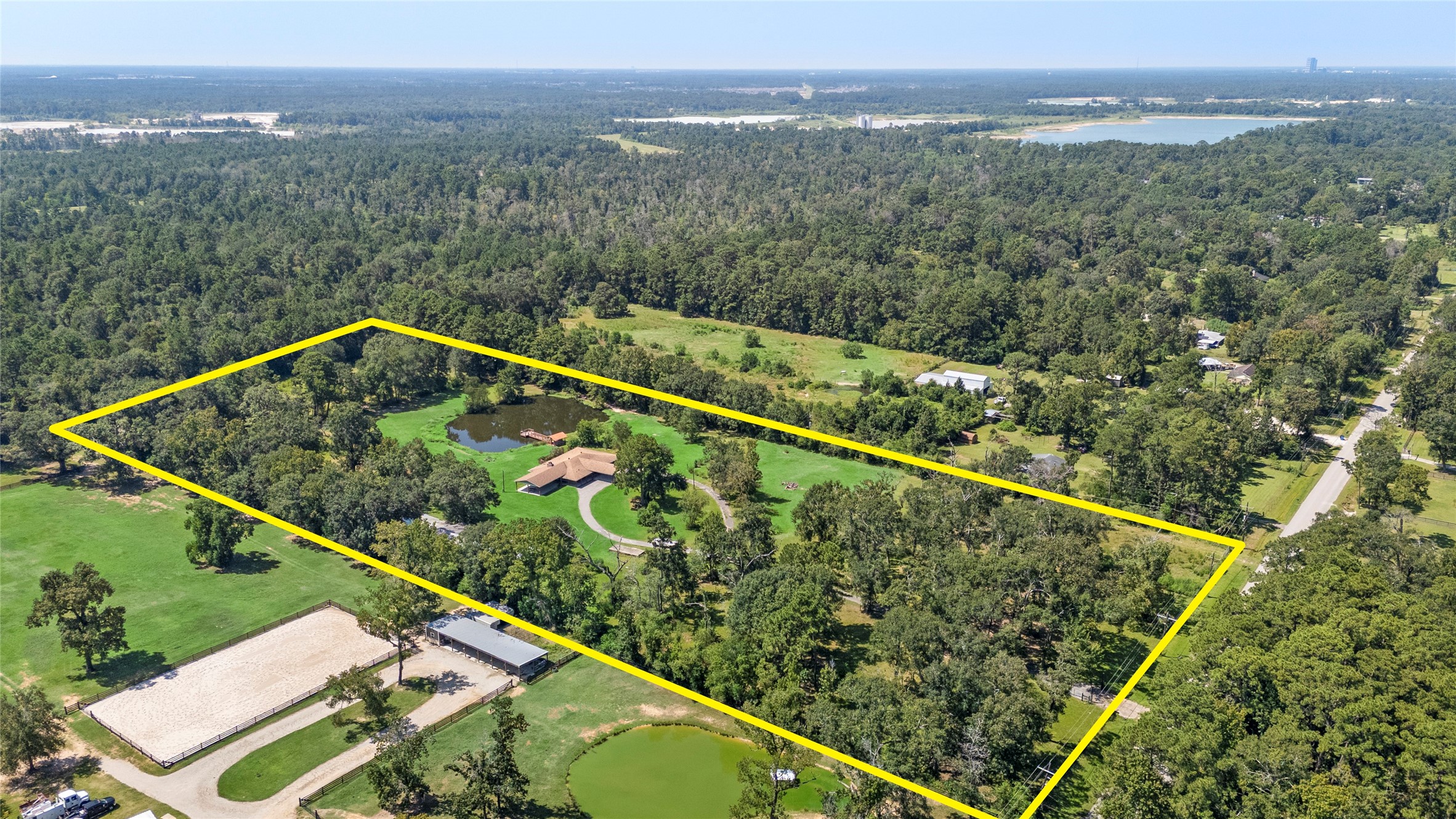 14818 Walker Road Conroe, TX 77302 - Photo 5 of 44 a view of a tennis court