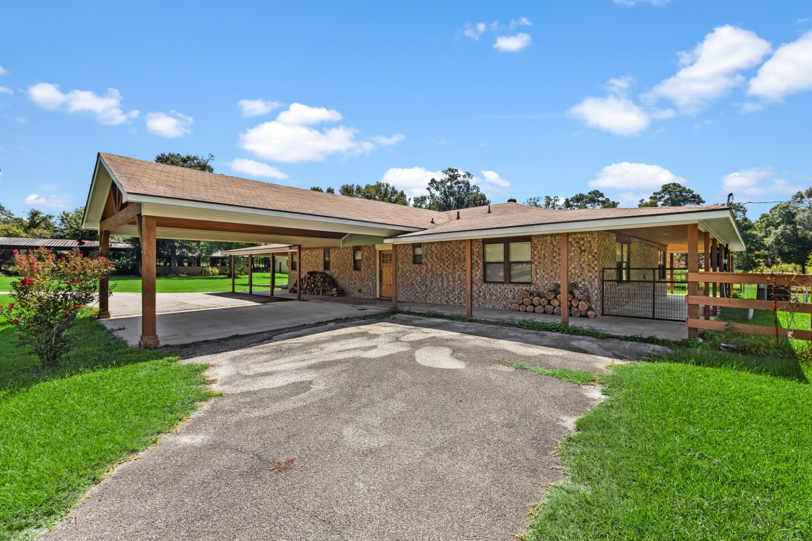 14818 Walker Road Conroe, TX 77302 - Photo 8 of 44 Front- Side of Home/Driveway