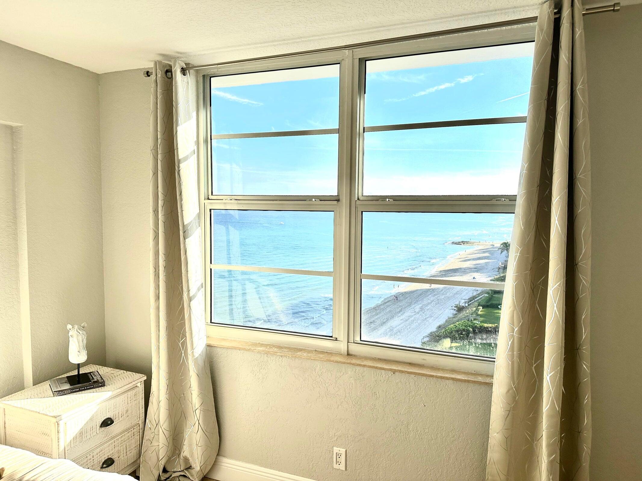 4511 South Ocean Boulevard, Unit 807 Highland Beach, FL 33487 - Photo 12 of 21 a bathroom with a window