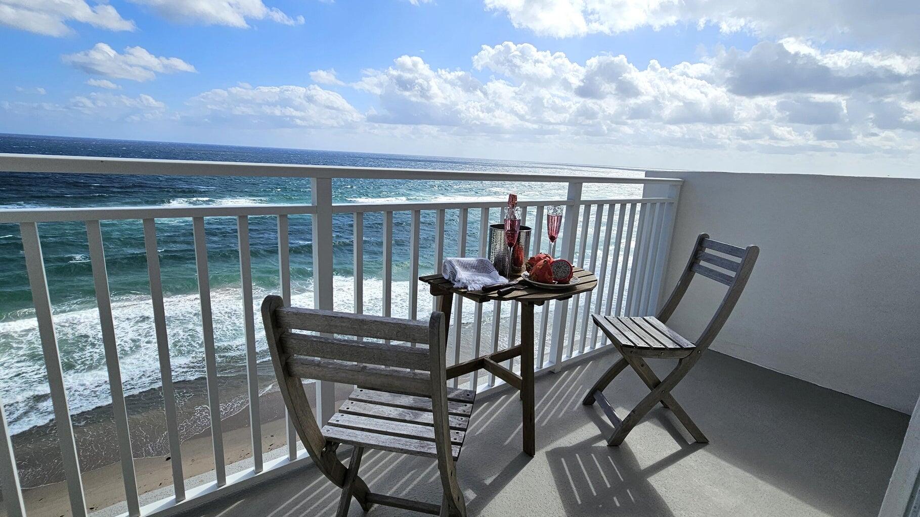 4511 South Ocean Boulevard, Unit 807 Highland Beach, FL 33487 - Photo 2 of 21 a view of a chairs and table in patio