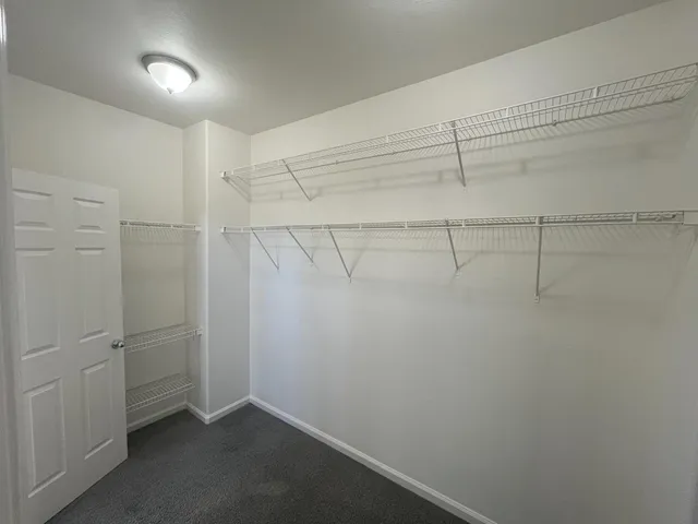 a view of a room with racks on the wall