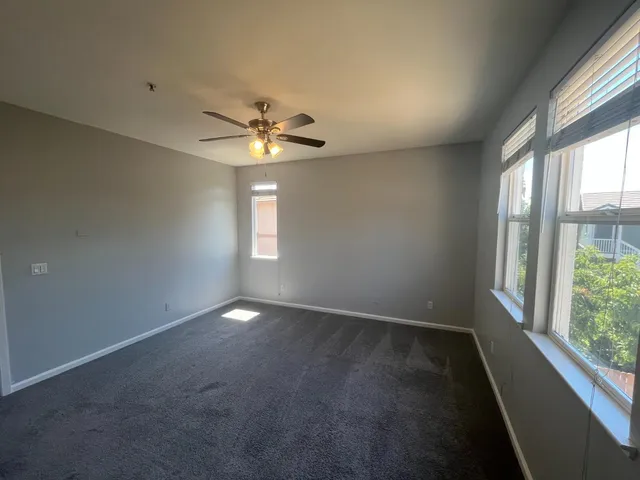 an empty room that has a window