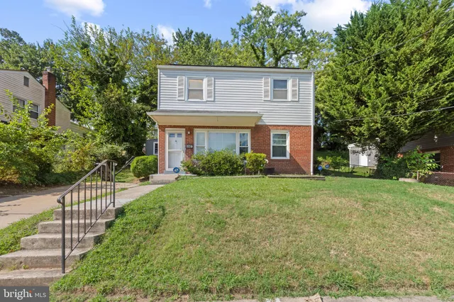 a house view with a garden space