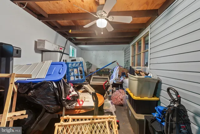 a view of a chairs and table in the balcony
