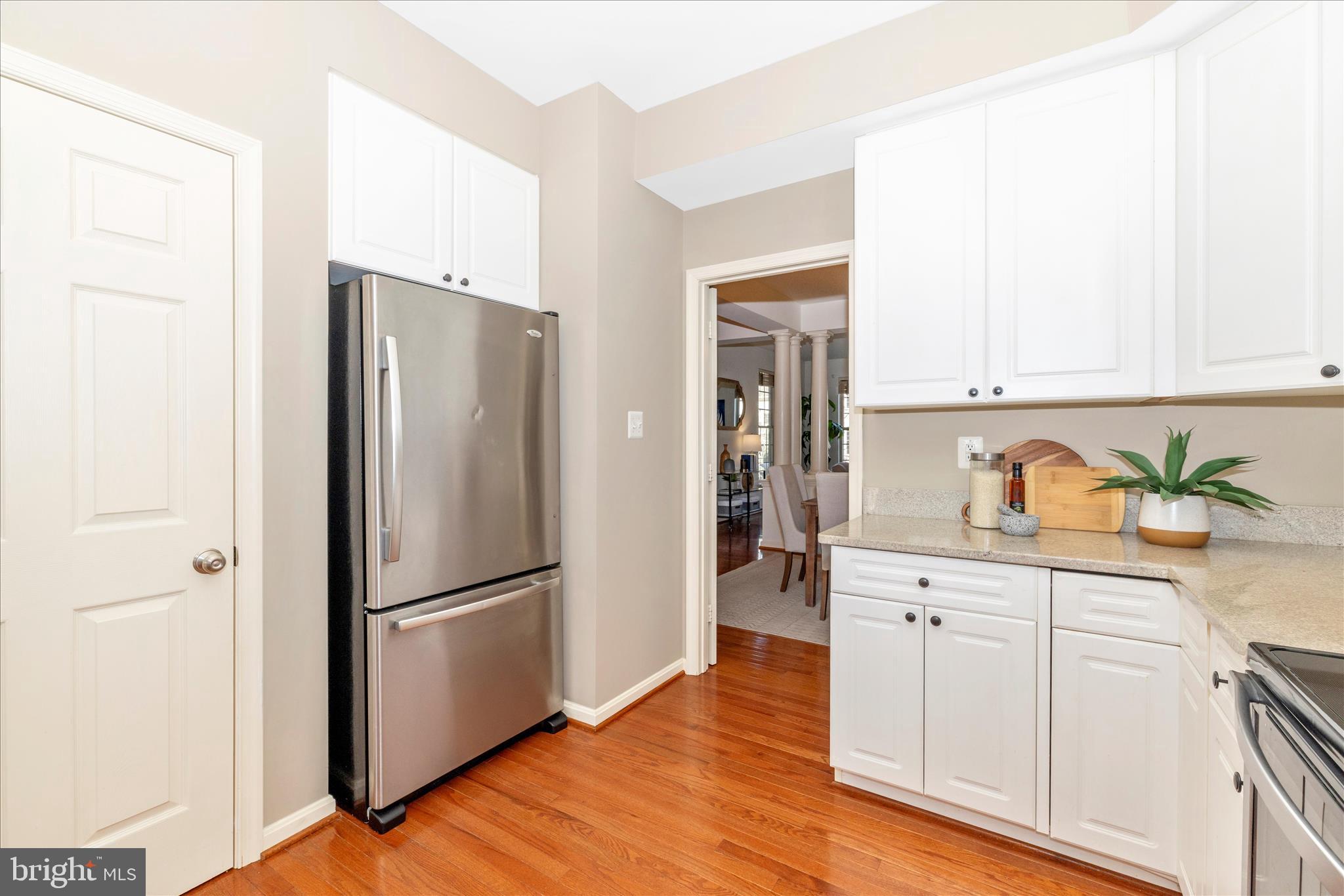 2409 Rippling Brook Road Frederick, MD 21701 - Photo 16 of 69 a kitchen with a refrigerator and a sink