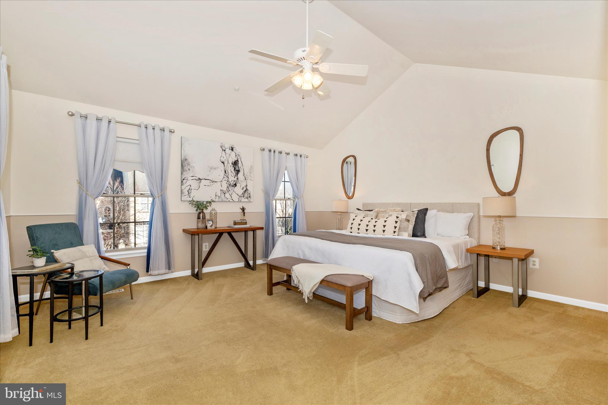 2409 Rippling Brook Road Frederick, MD 21701 - Photo 25 of 69 a spacious bedroom with a bed and a table