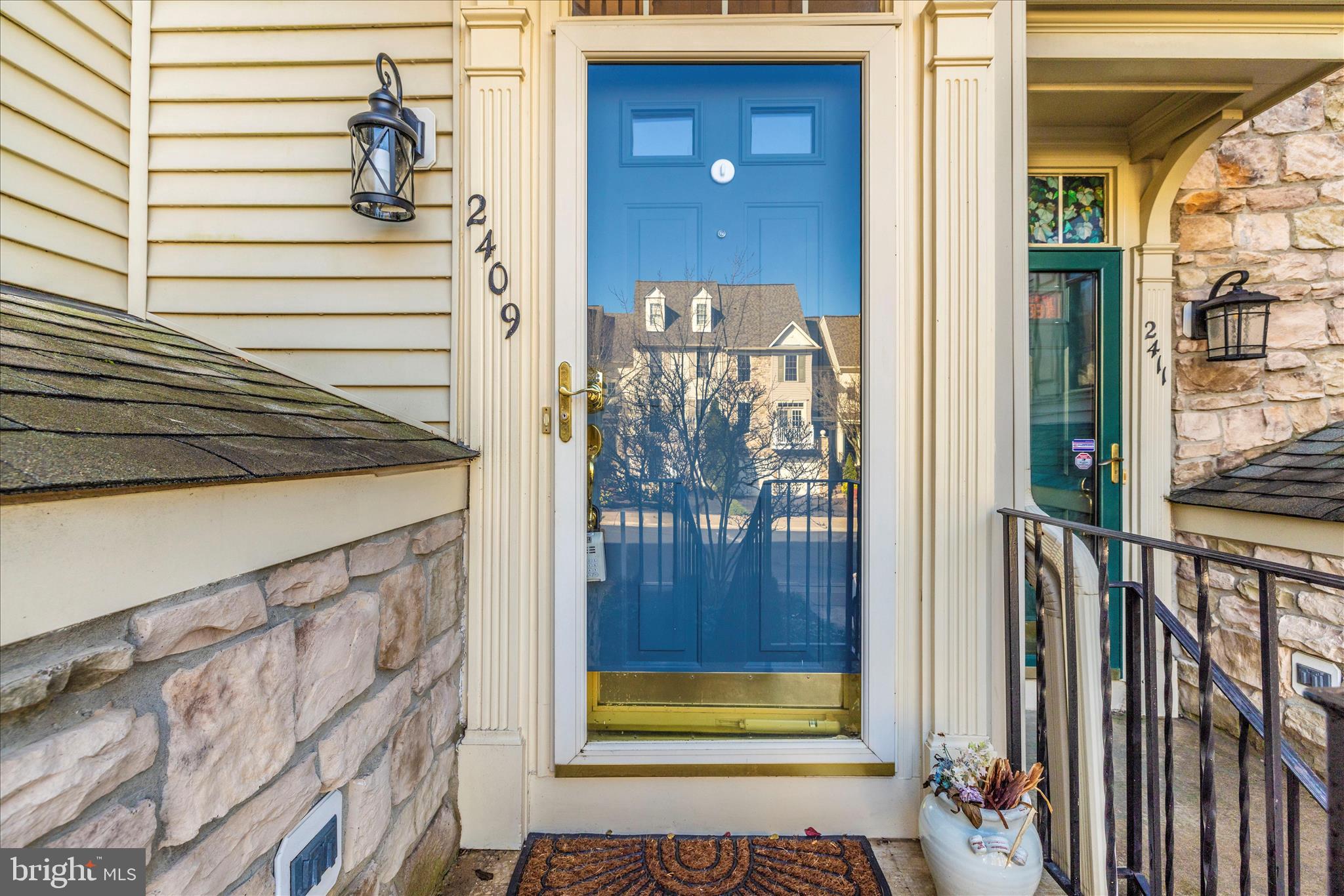 2409 Rippling Brook Road Frederick, MD 21701 - Photo 3 of 69 a view of a entryway door of the house