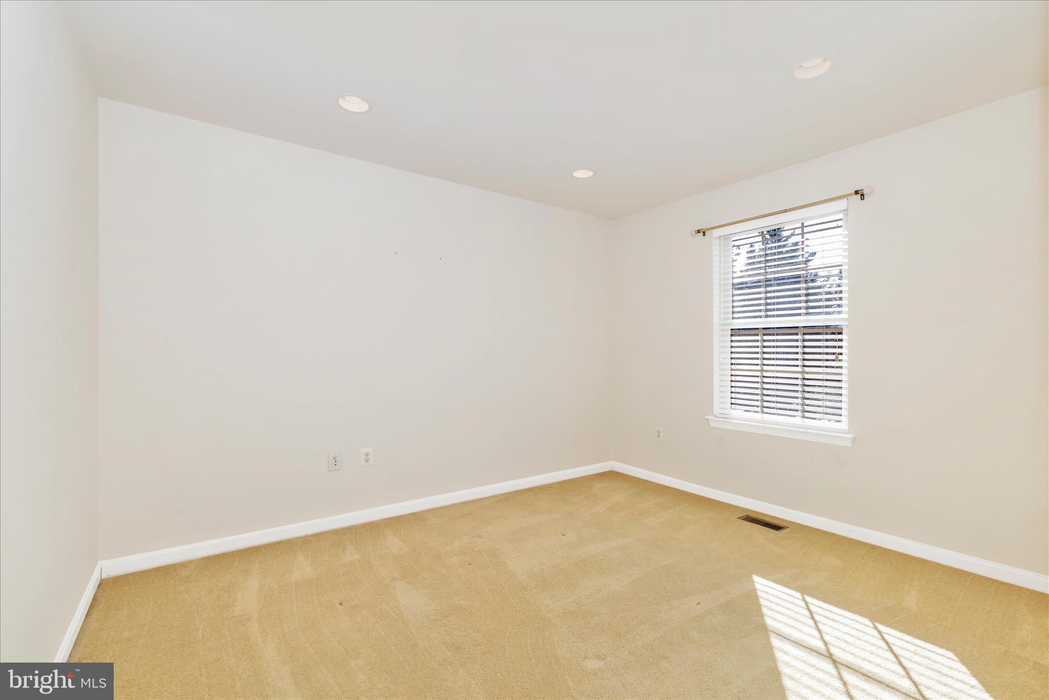 2409 Rippling Brook Road Frederick, MD 21701 - Photo 32 of 69 a view of an empty room with a window