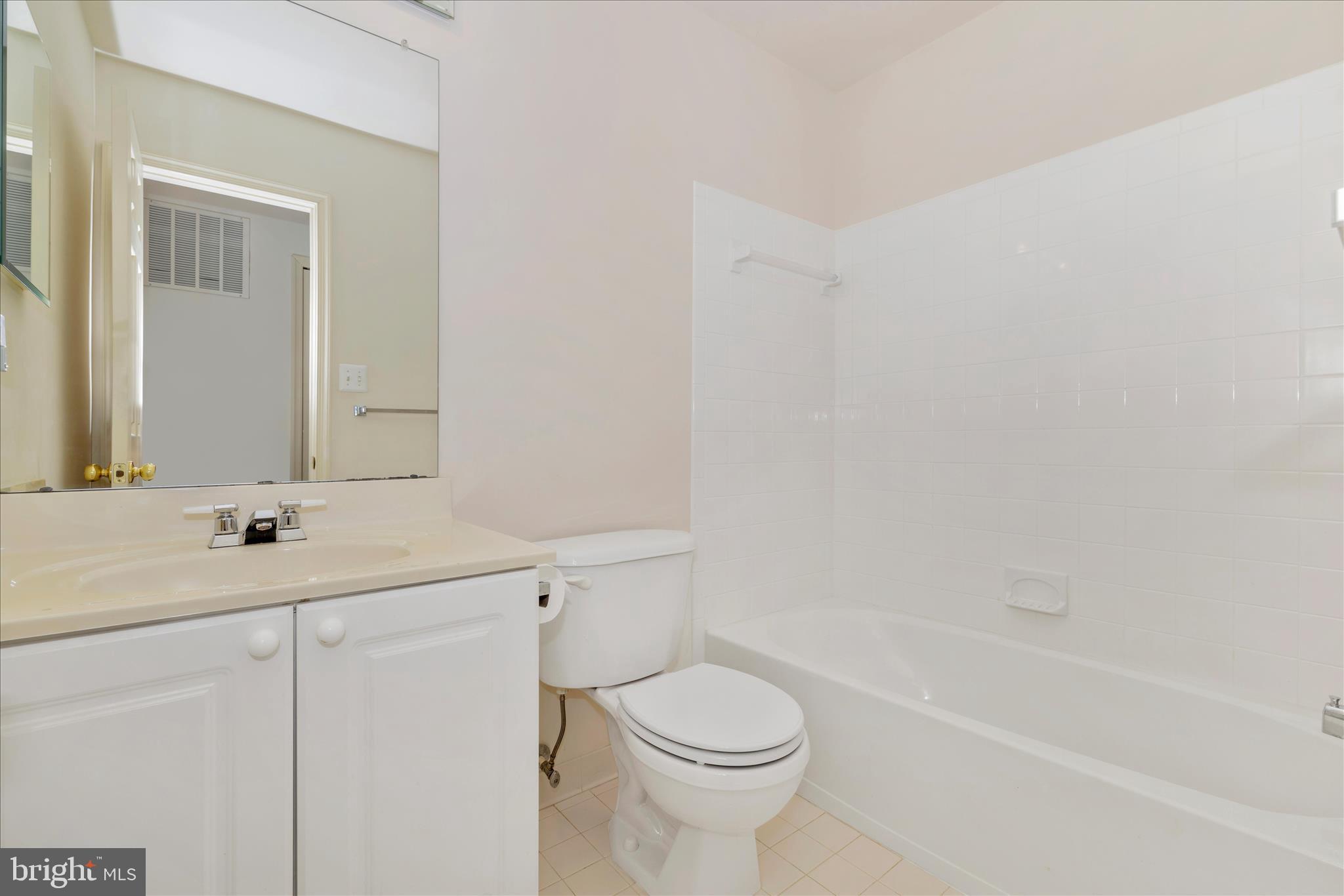 2409 Rippling Brook Road Frederick, MD 21701 - Photo 36 of 69 a bathroom with a sink a toilet and a bathtub