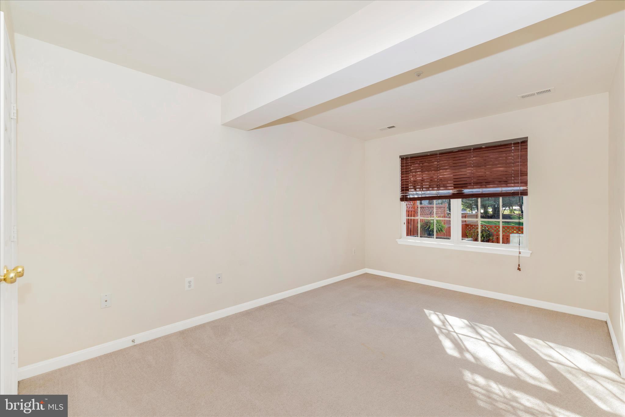 2409 Rippling Brook Road Frederick, MD 21701 - Photo 40 of 69 a view of an empty room with a window