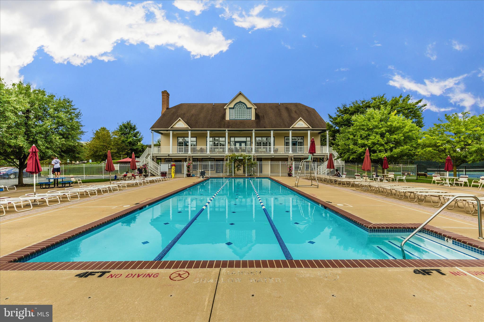 2409 Rippling Brook Road Frederick, MD 21701 - Photo 56 of 69 a view of swimming pool with outdoor seating and plants