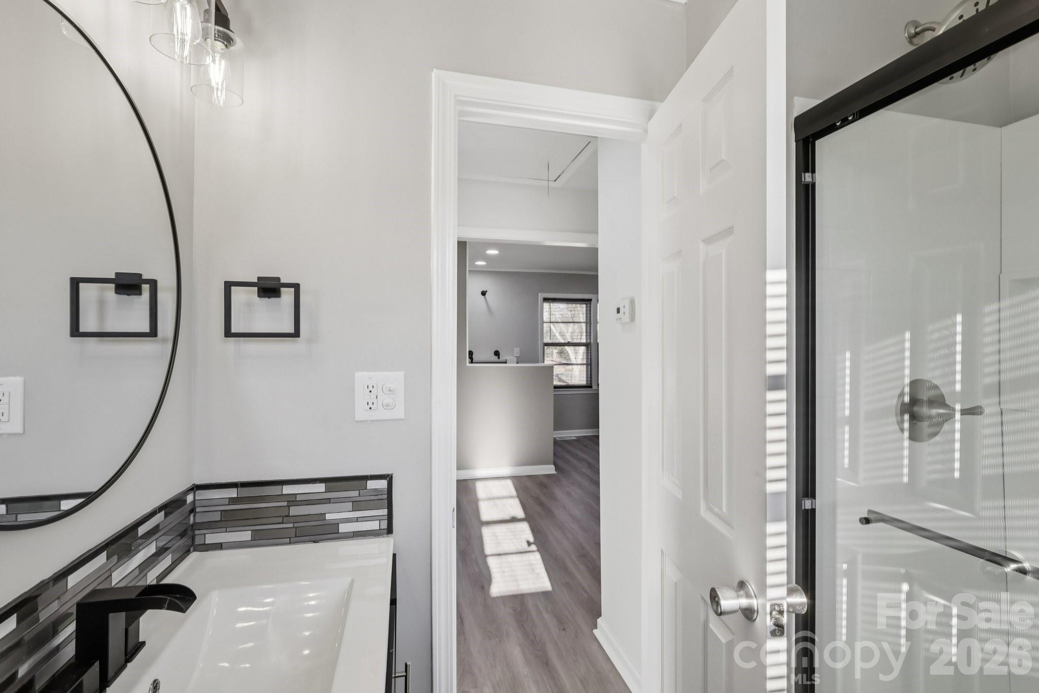 3207 Valley Dale Road Monroe, NC 28110 - Photo 22 of 30 a view of a hallway with wooden floor and entryway