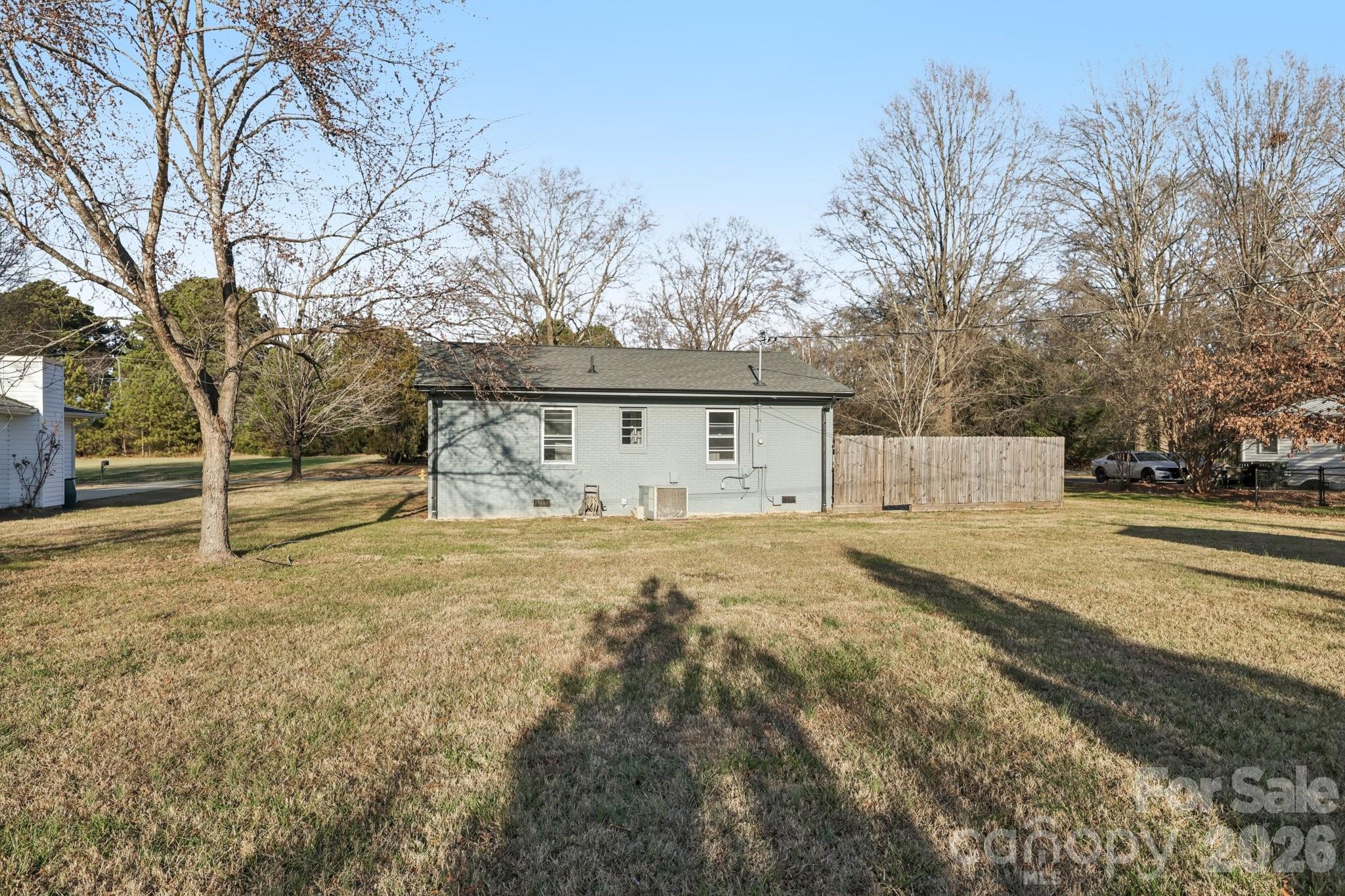 3207 Valley Dale Road Monroe, NC 28110 - Photo 25 of 30 a front view of a house with a yard and garage