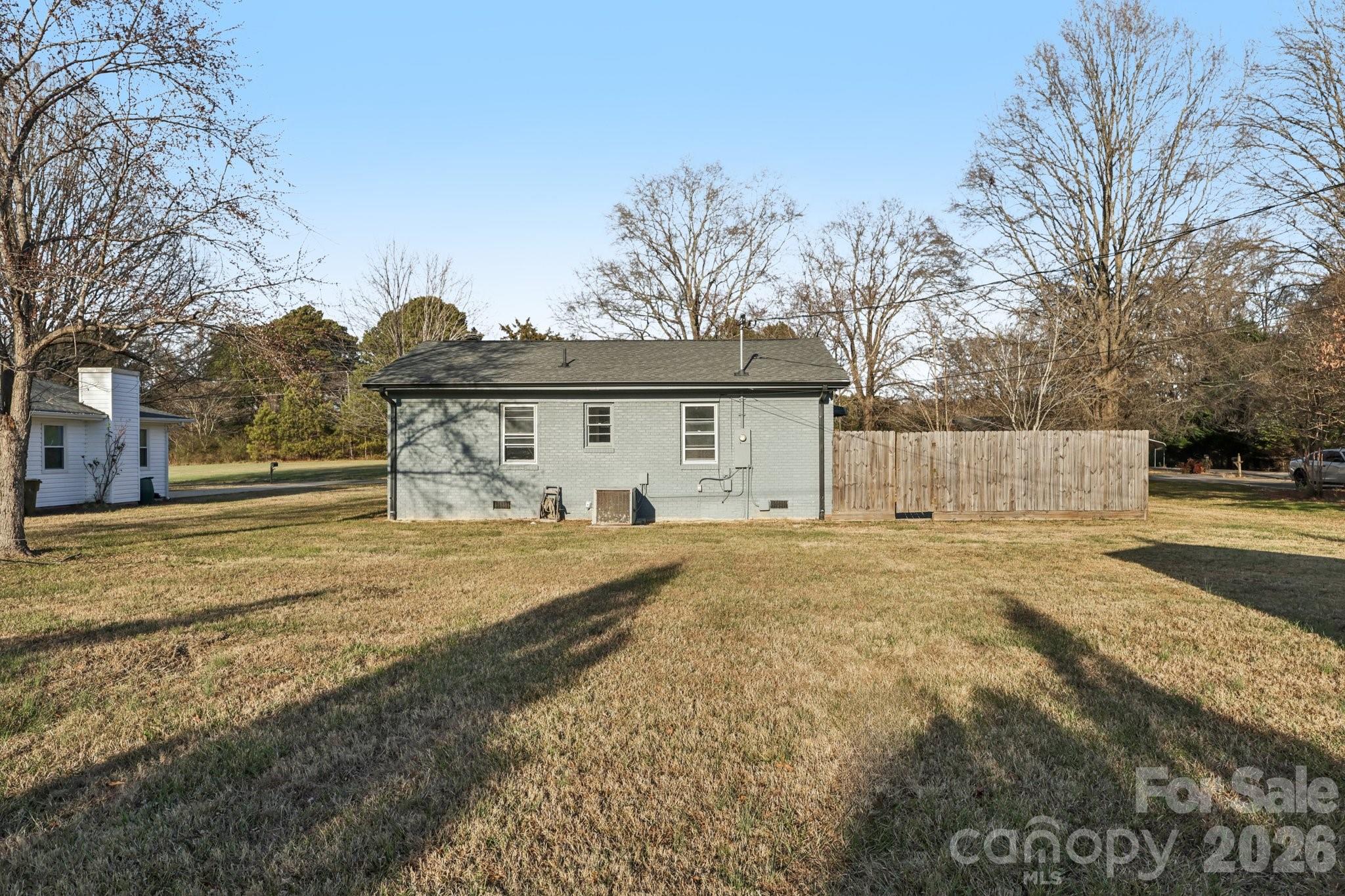 3207 Valley Dale Road Monroe, NC 28110 - Photo 27 of 30 a front view of a house with a yard and garage