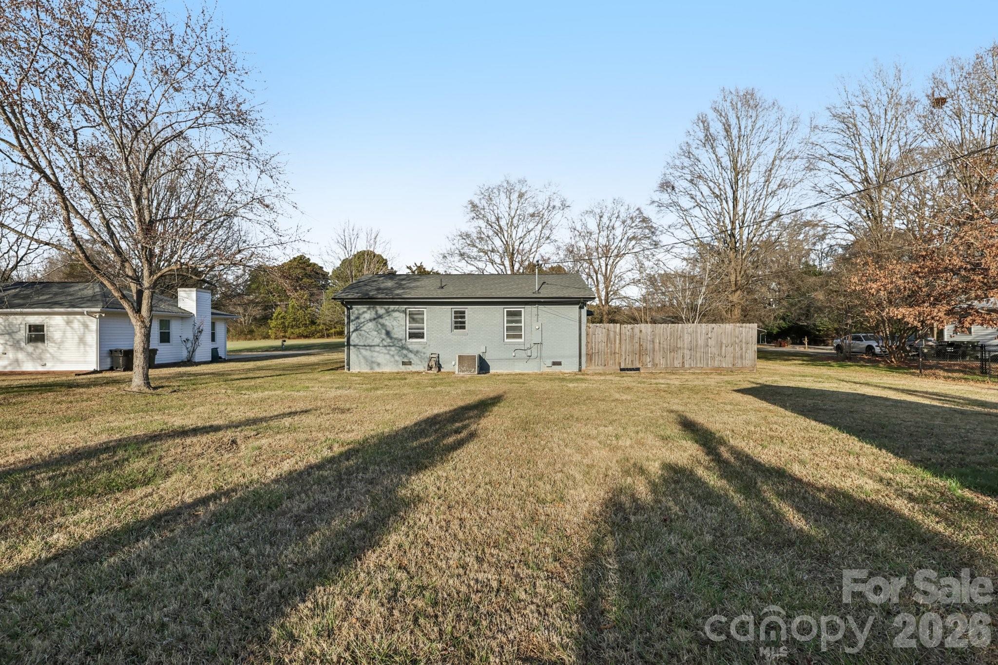 3207 Valley Dale Road Monroe, NC 28110 - Photo 28 of 30 a front view of a house with a yard and garage