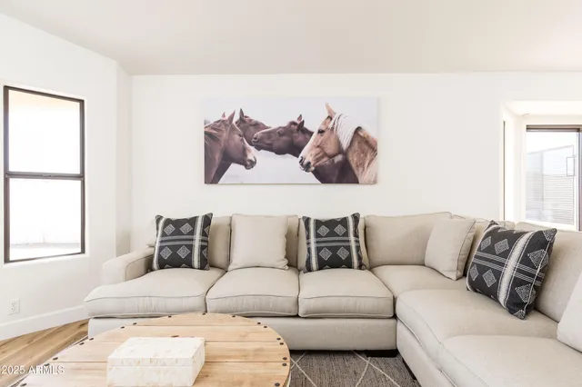 a living room with furniture and a couch