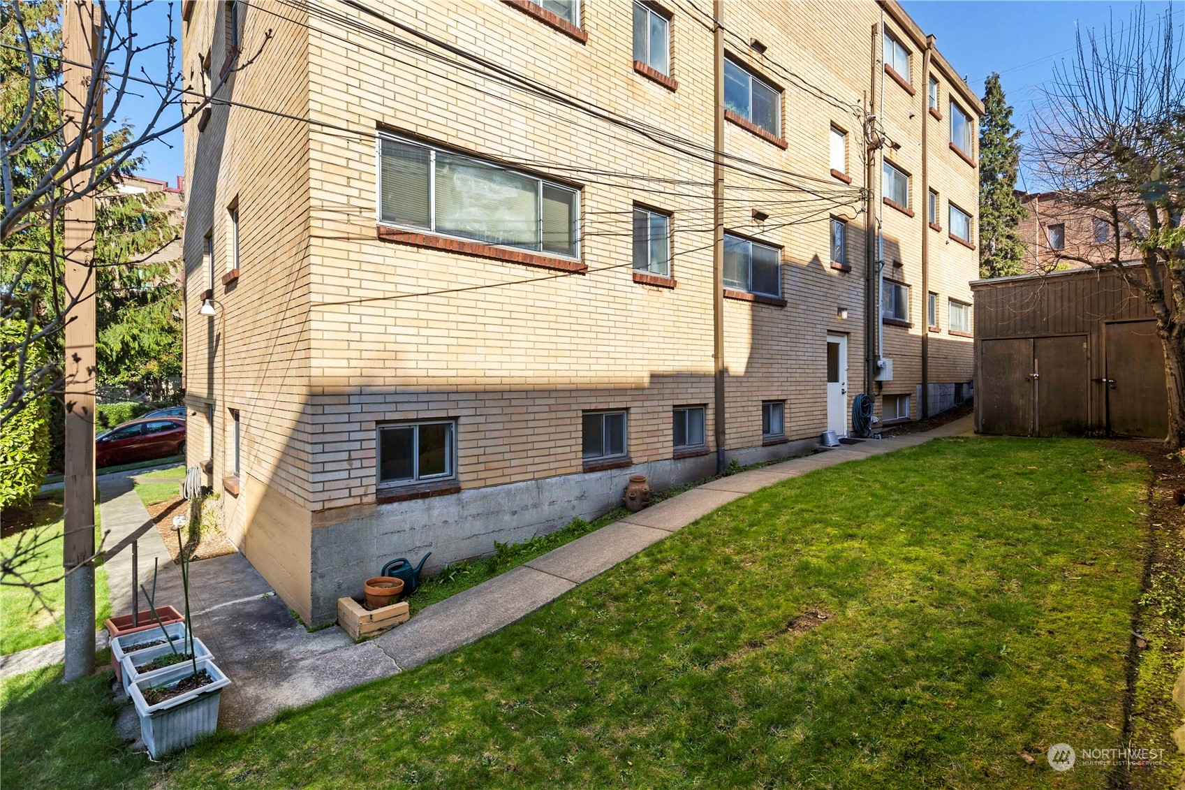 93 East Boston Street Seattle, WA 98102 - Photo 3 of 12 a view of backyard with a garden