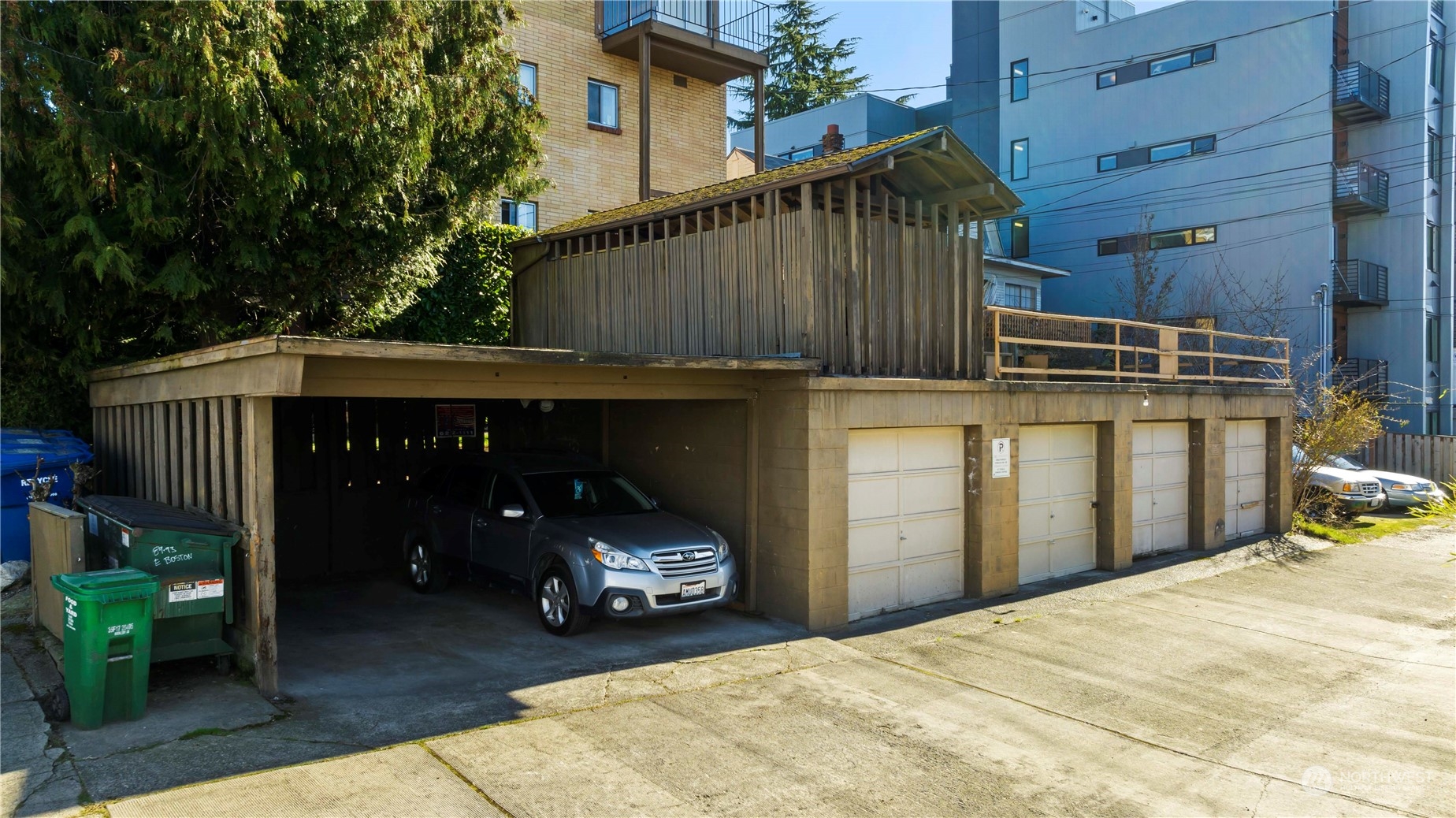 93 East Boston Street Seattle, WA 98102 - Photo 4 of 12 a view of a car park in front of house