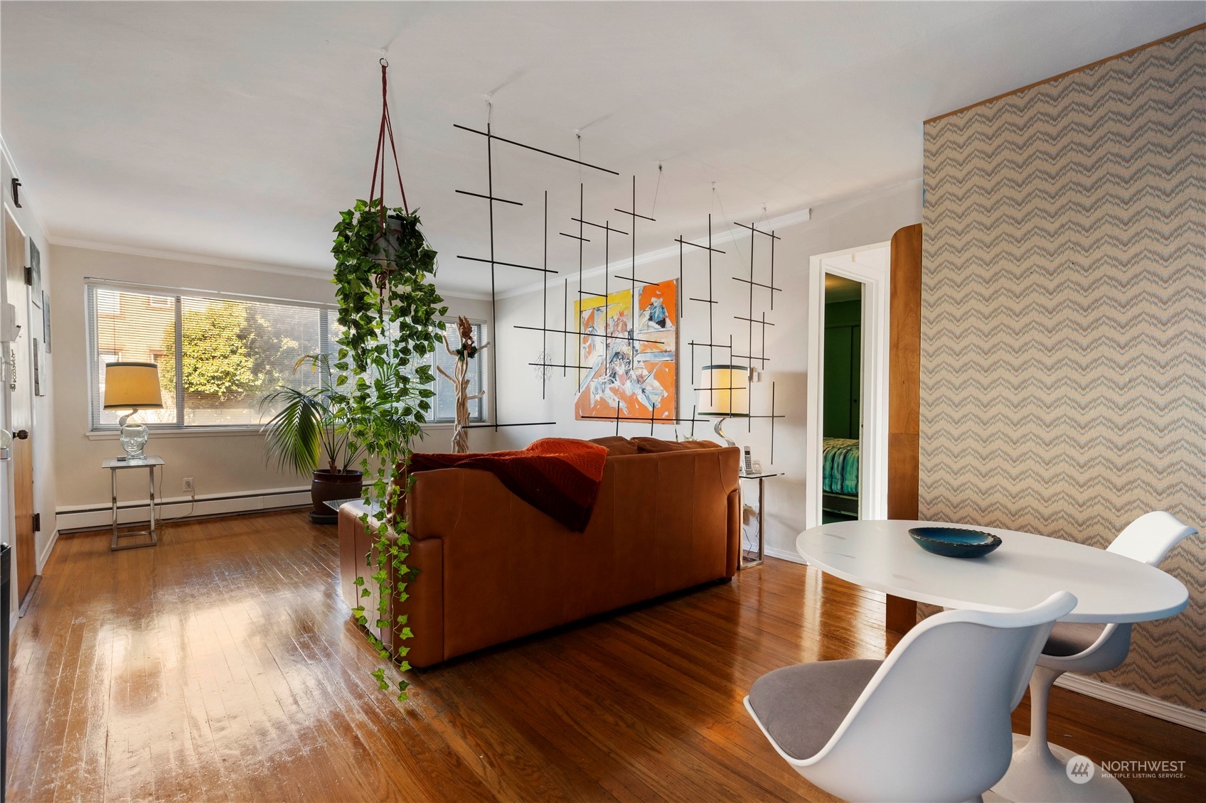 93 East Boston Street Seattle, WA 98102 - Photo 9 of 12 a living room with furniture and a potted plant