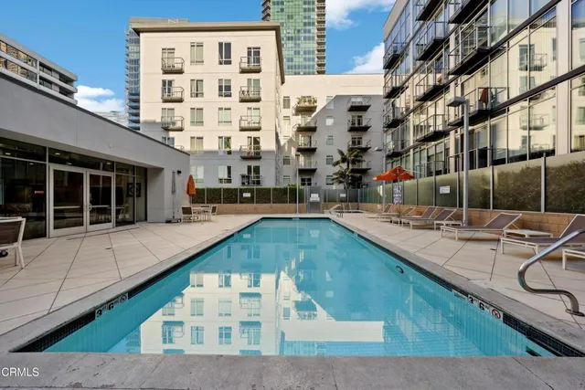 a outdoor space with lots of white furniture