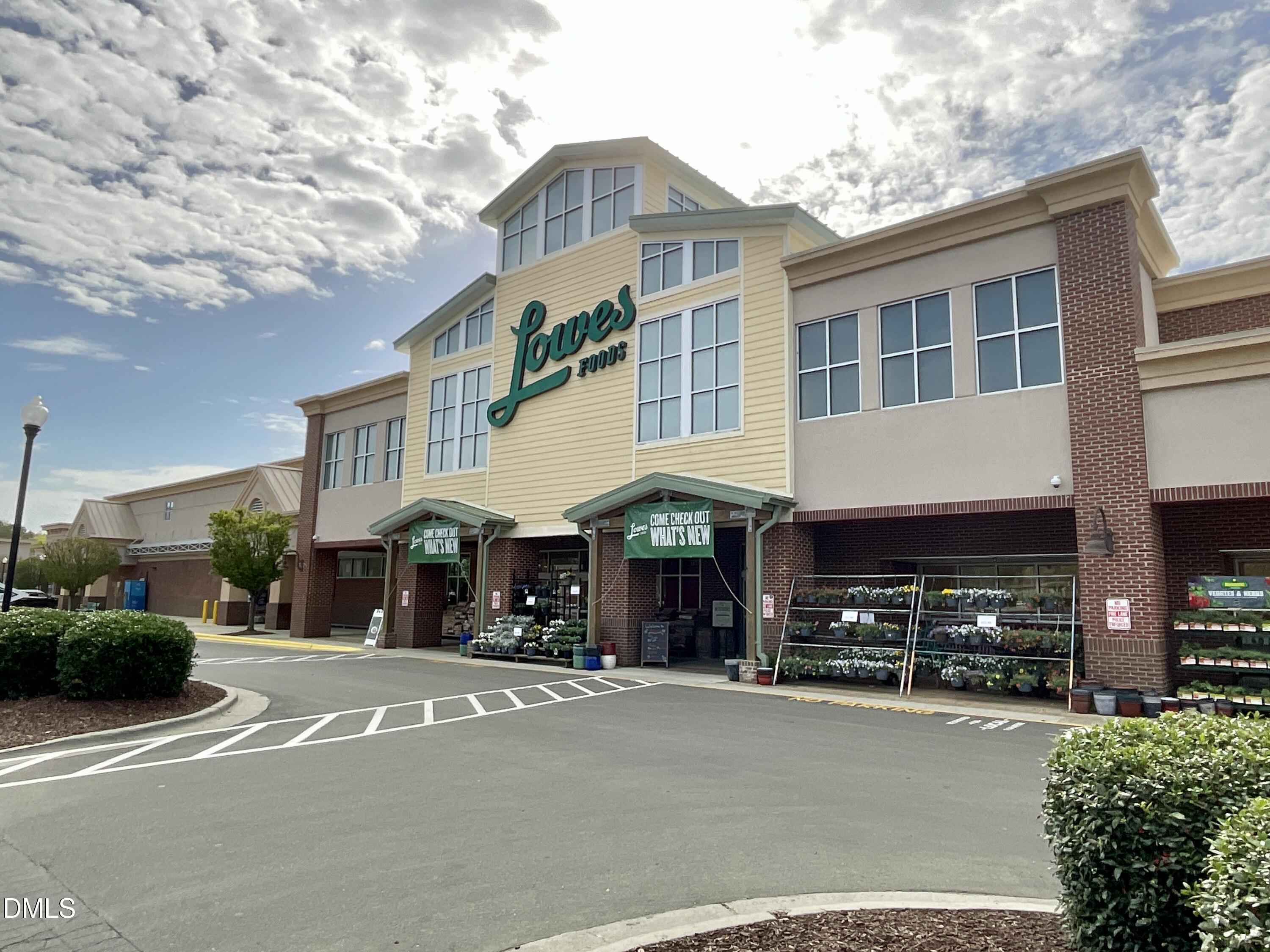 8712 Wardle Court Wake Forest, NC 27587 - Photo 18 of 33 a view of a street with stores