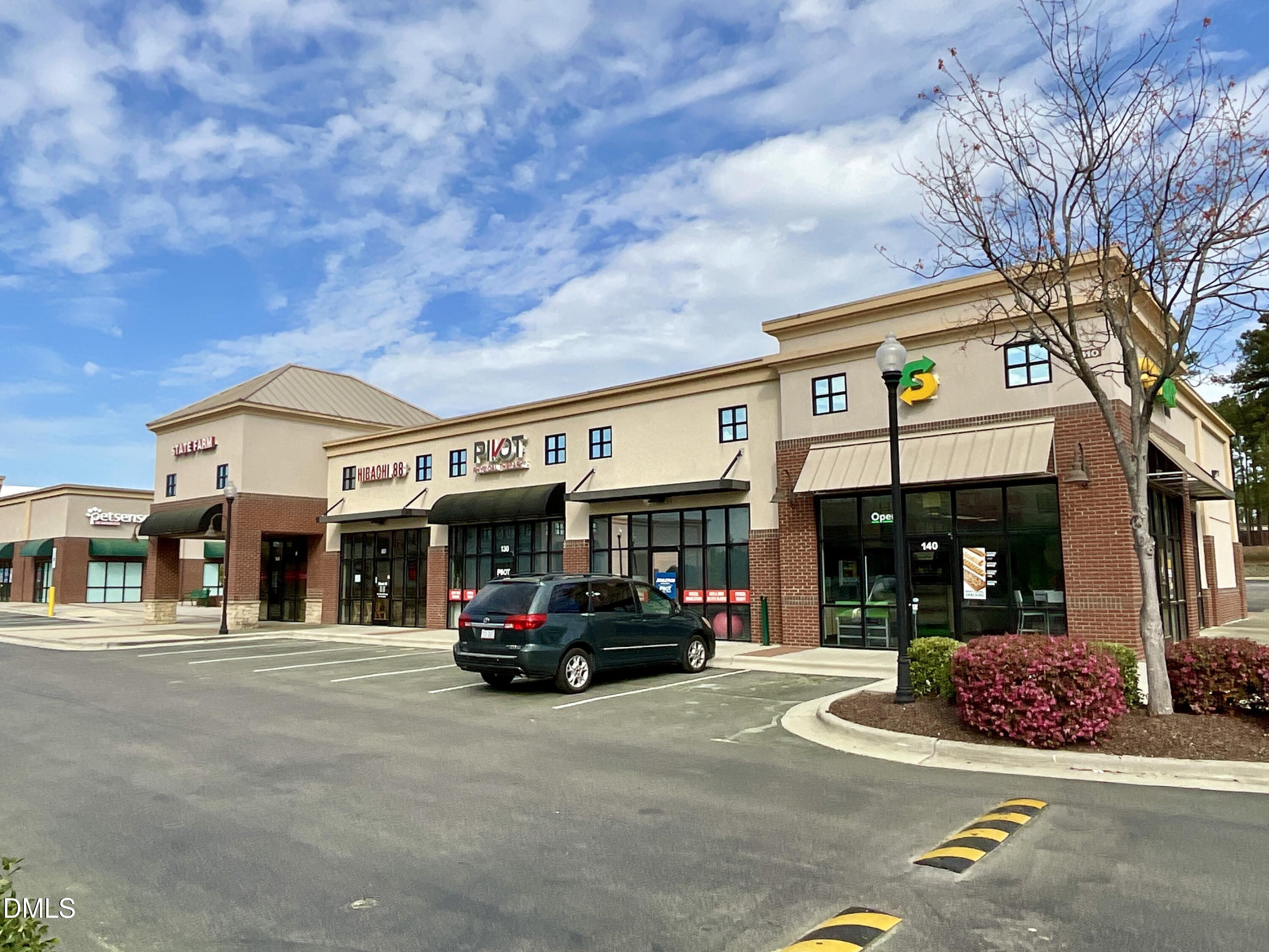 8712 Wardle Court Wake Forest, NC 27587 - Photo 20 of 33 a car parked in front of a building