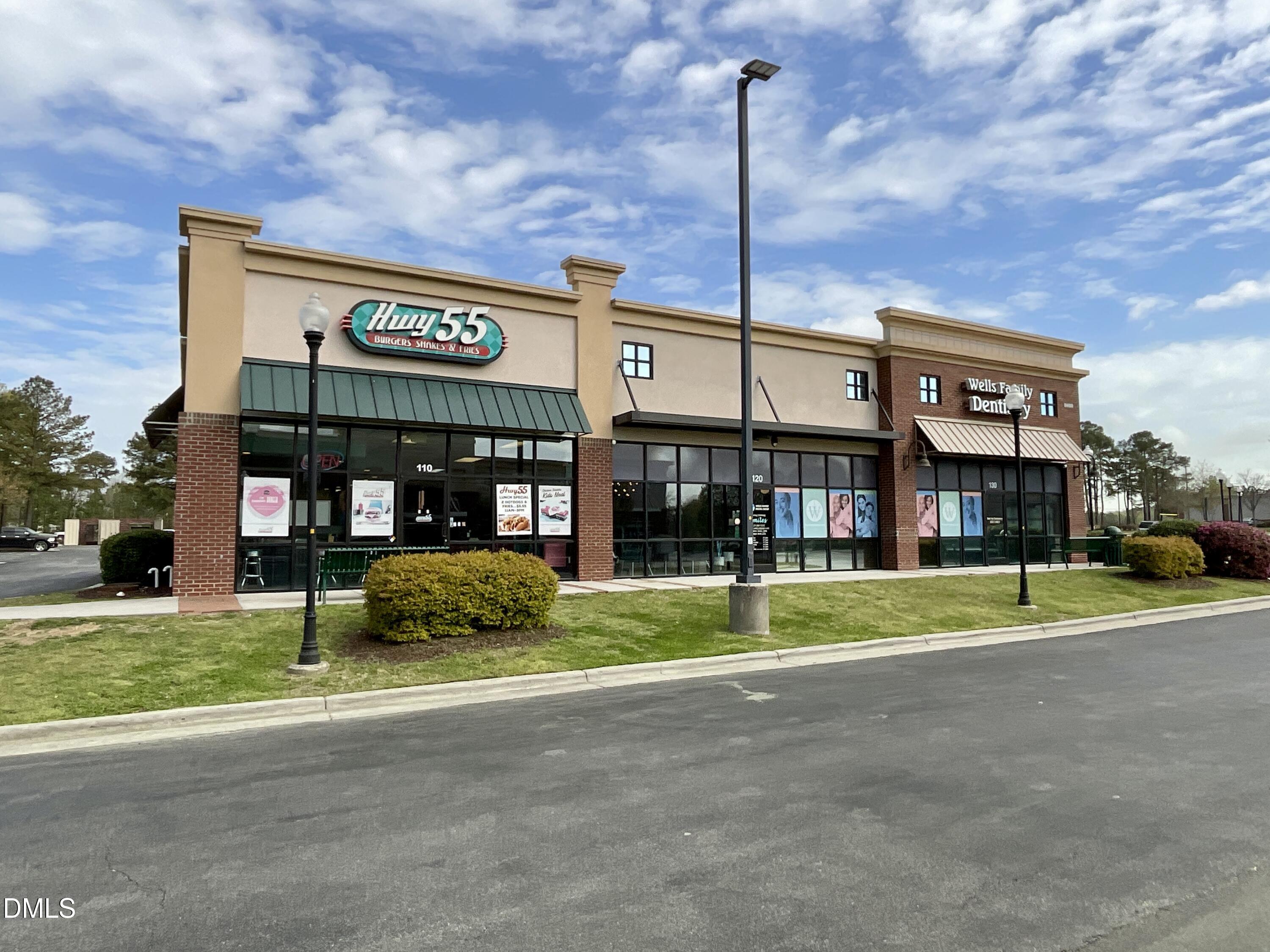8712 Wardle Court Wake Forest, NC 27587 - Photo 26 of 33 a view of a building with a yard