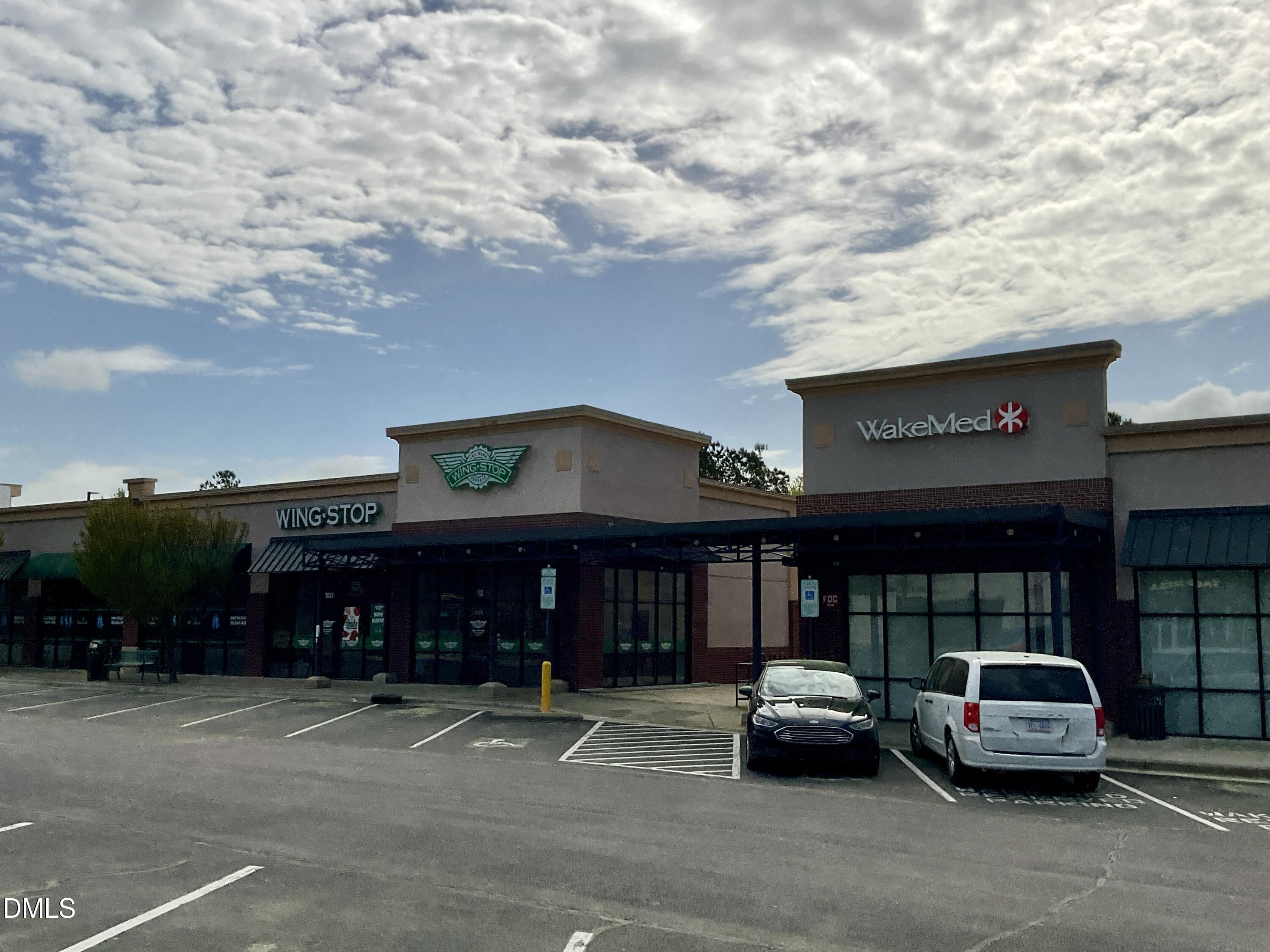 8712 Wardle Court Wake Forest, NC 27587 - Photo 28 of 33 a car parked in front of a store