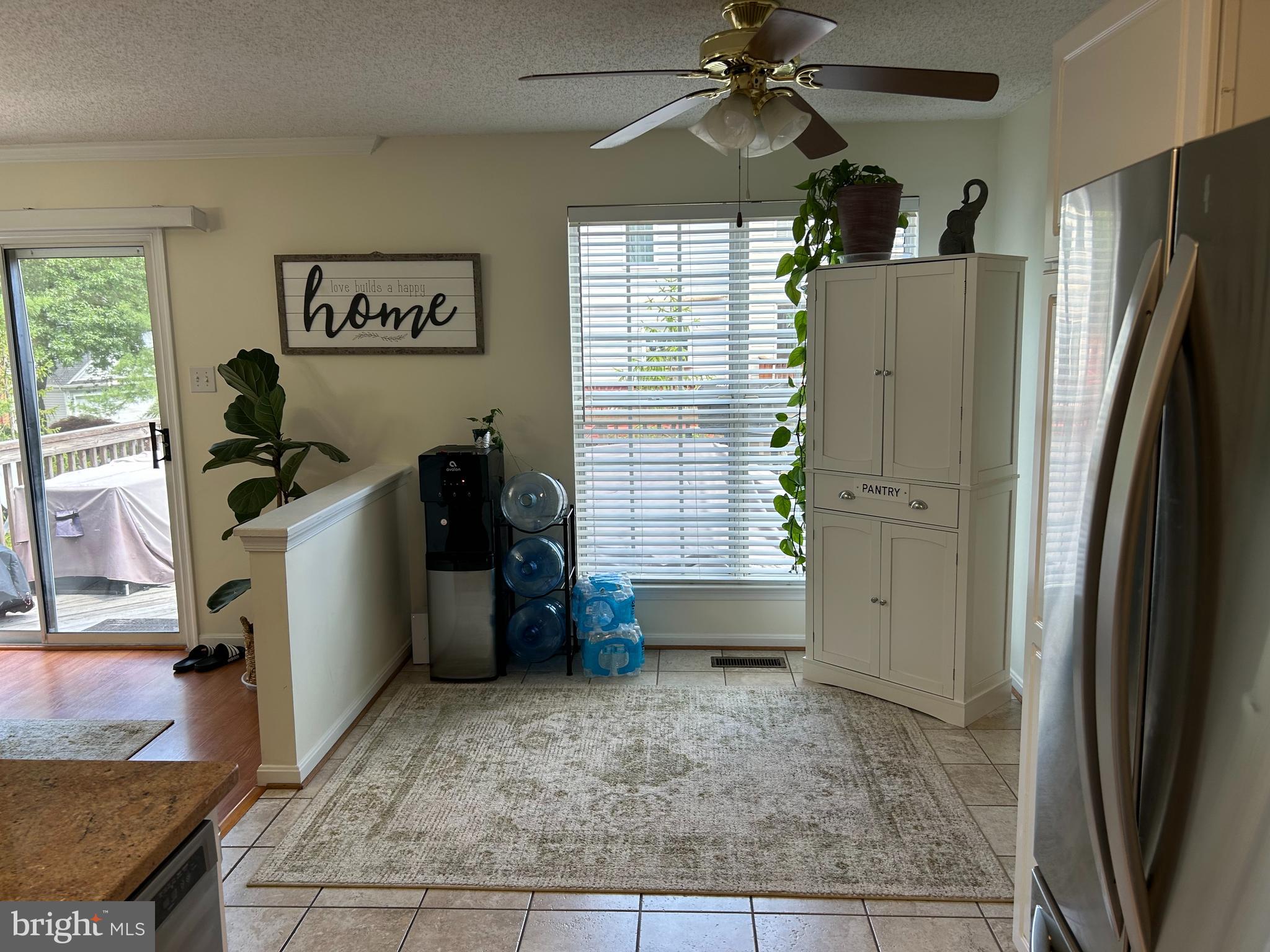 2304 Cold Meadow Way Silver Spring, MD 20906 - Photo 11 of 42 a kitchen with a refrigerator and a sink