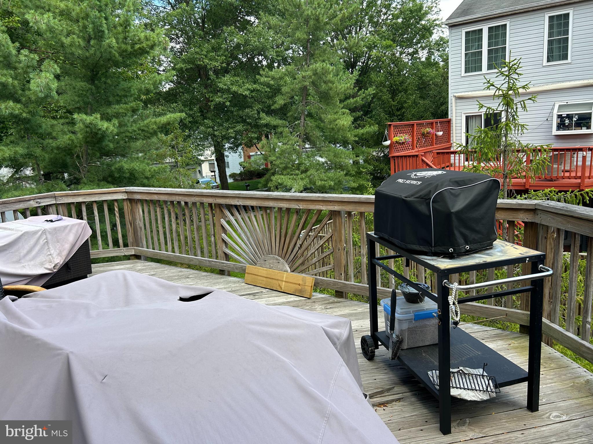 2304 Cold Meadow Way Silver Spring, MD 20906 - Photo 14 of 42 a view of balcony with wooden floor and outdoor seating