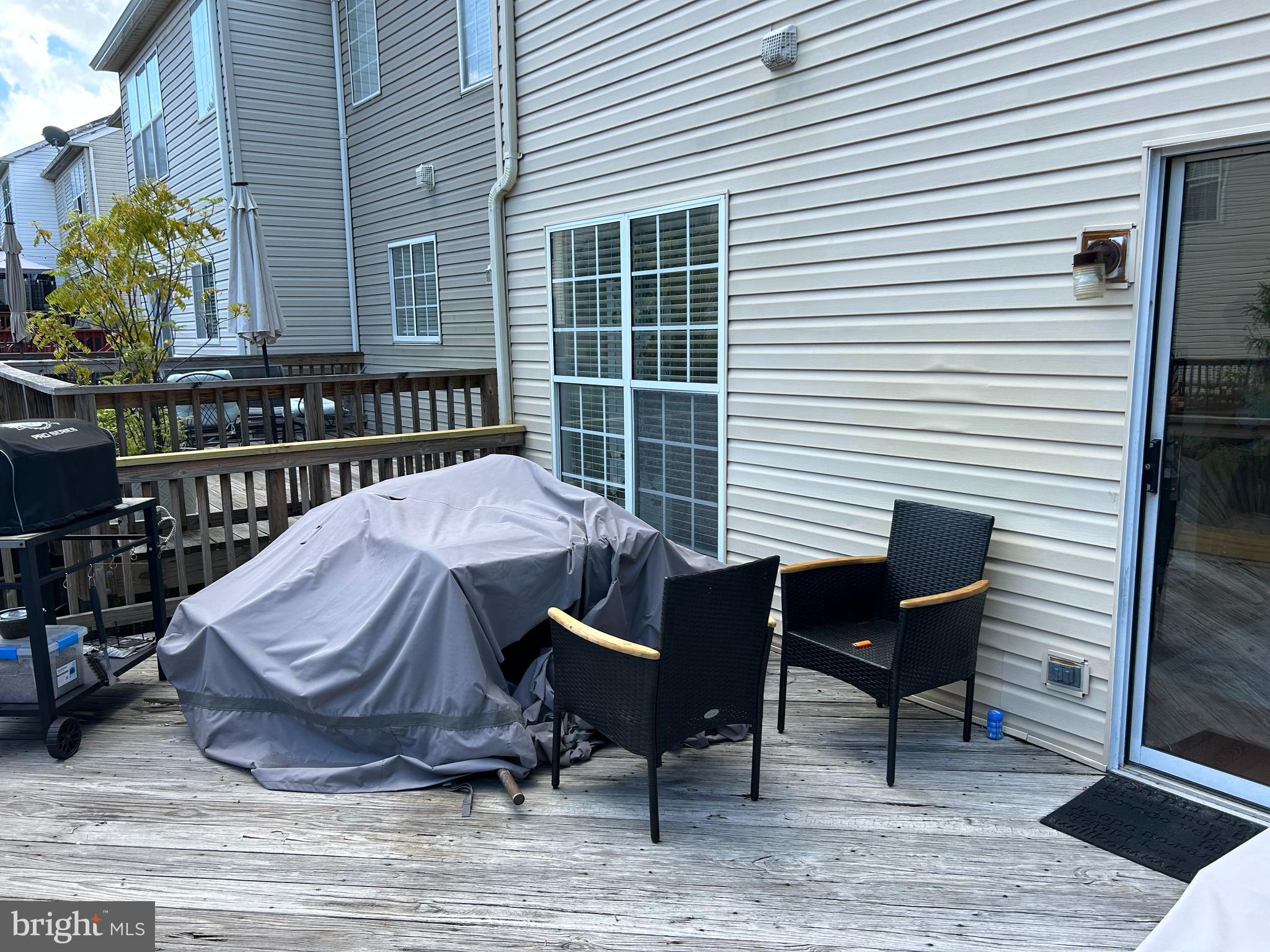 2304 Cold Meadow Way Silver Spring, MD 20906 - Photo 15 of 42 a view of a roof deck with chair and table