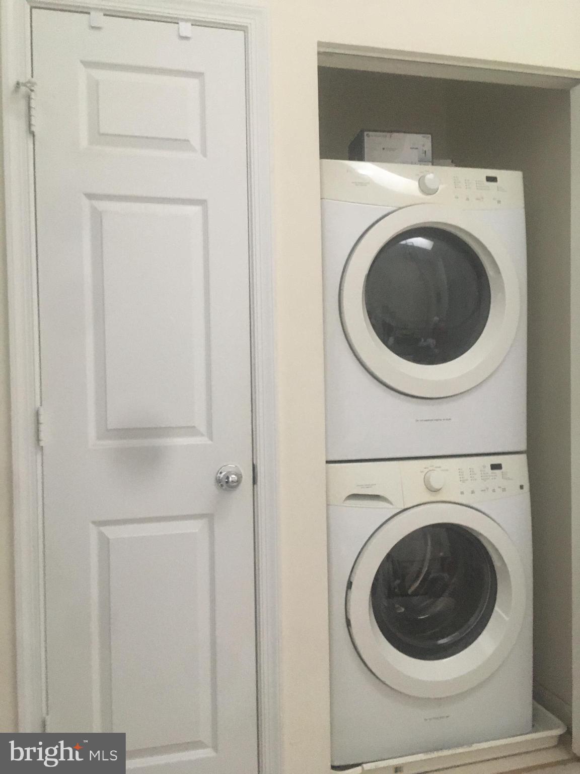 2304 Cold Meadow Way Silver Spring, MD 20906 - Photo 26 of 42 a utility room with dryer and washer