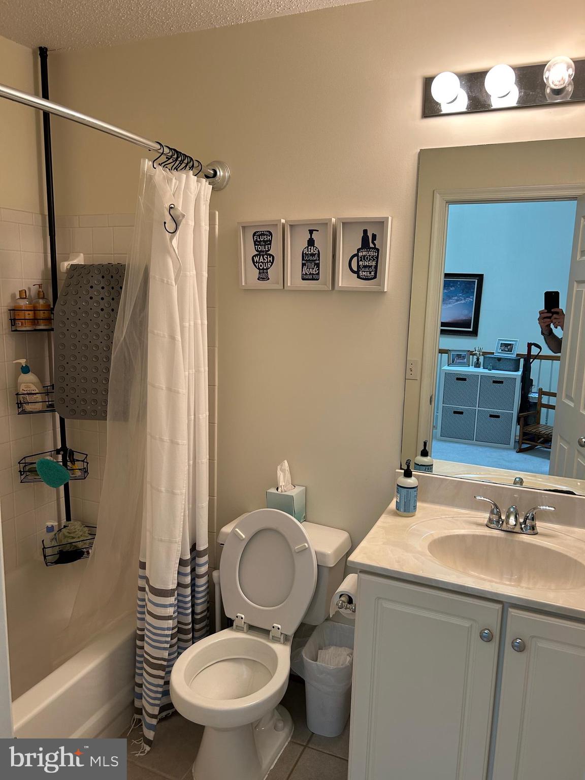2304 Cold Meadow Way Silver Spring, MD 20906 - Photo 33 of 42 a bathroom with a sink toilet and shower