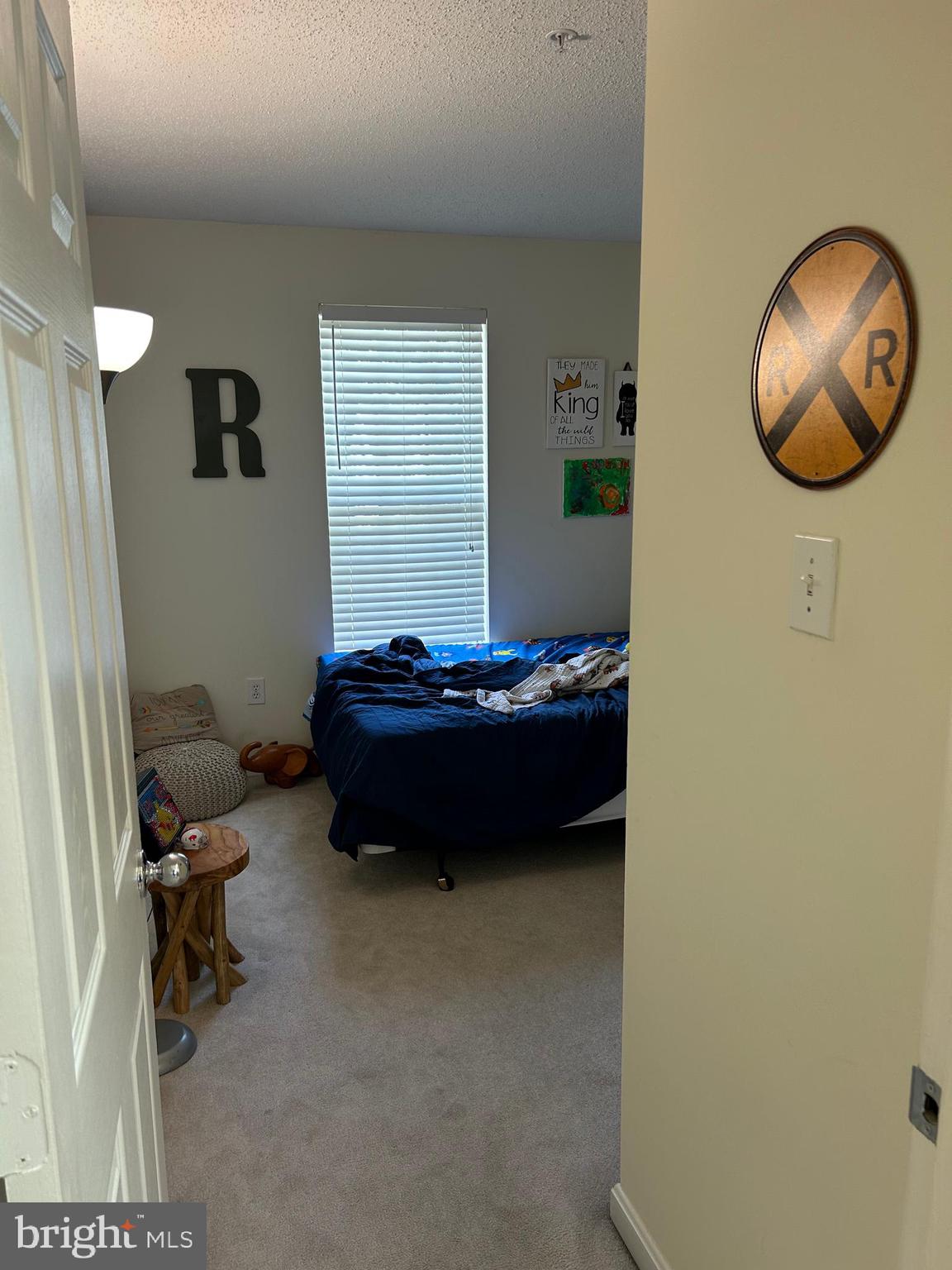 2304 Cold Meadow Way Silver Spring, MD 20906 - Photo 36 of 42 a living room with furniture and a mirror