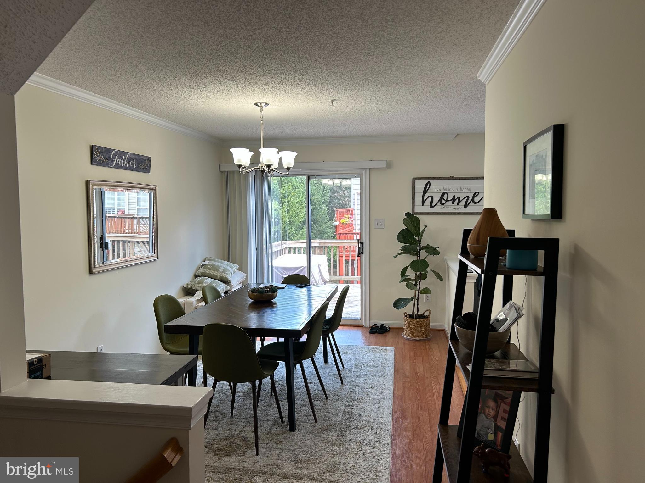 2304 Cold Meadow Way Silver Spring, MD 20906 - Photo 8 of 42 a view of a dining room with furniture window and wooden floor