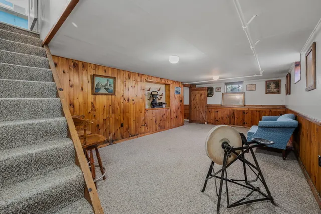 a view of a livingroom with furniture and wooden floor