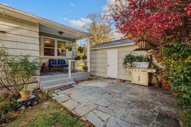 a view of a house with a patio