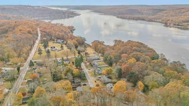 an aerial view of residential house with outdoor space