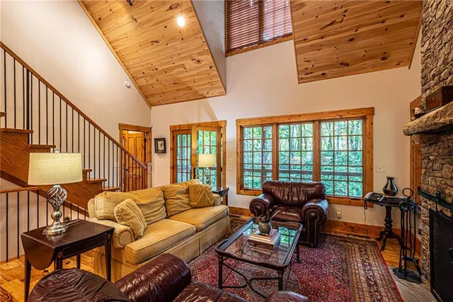 a bedroom with a bed and a ceiling fan