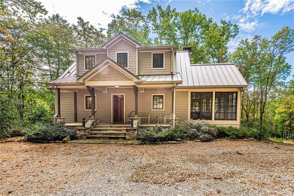 1038 Wilkins Cove Road Suches, GA 30572 - Photo 2 of 89 a front view of a house with a yard